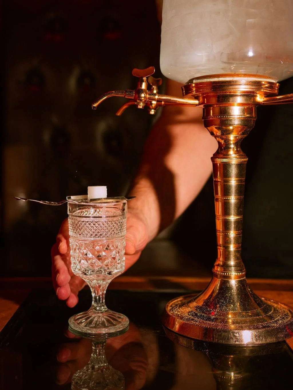 ✨Absinthe Service✨
Ice water drips from our vintage fountain over a sugar cube into a pour of absinthe, either @kublerabsintheusa or @stgeorgespirits , slowly mixing into a mysterious, licorice cocktail that elevates any evening. Let us set one up fo