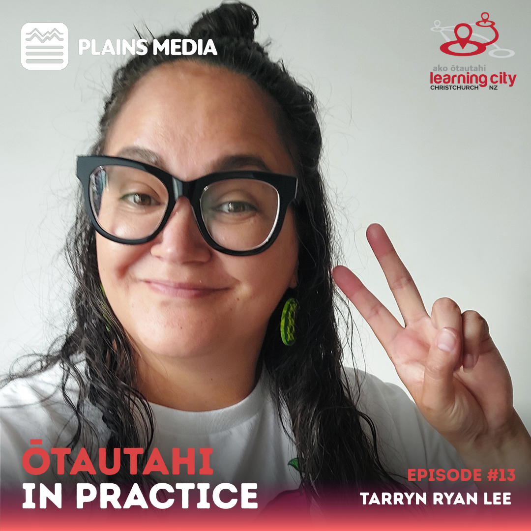 Tarryn Ryan looking at the camera and doing a peace sign with her hand