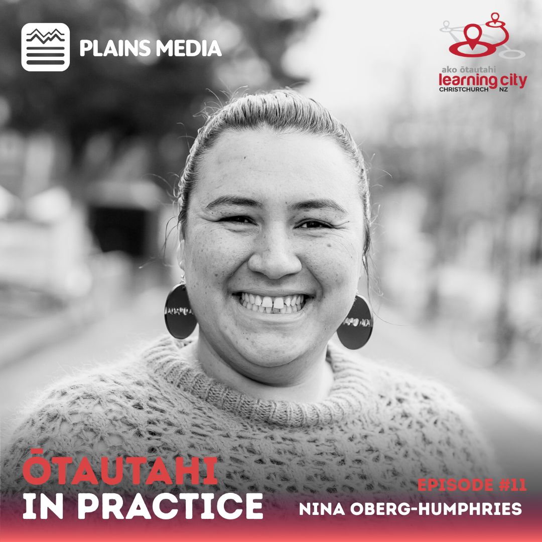 Nina smiles at the camera