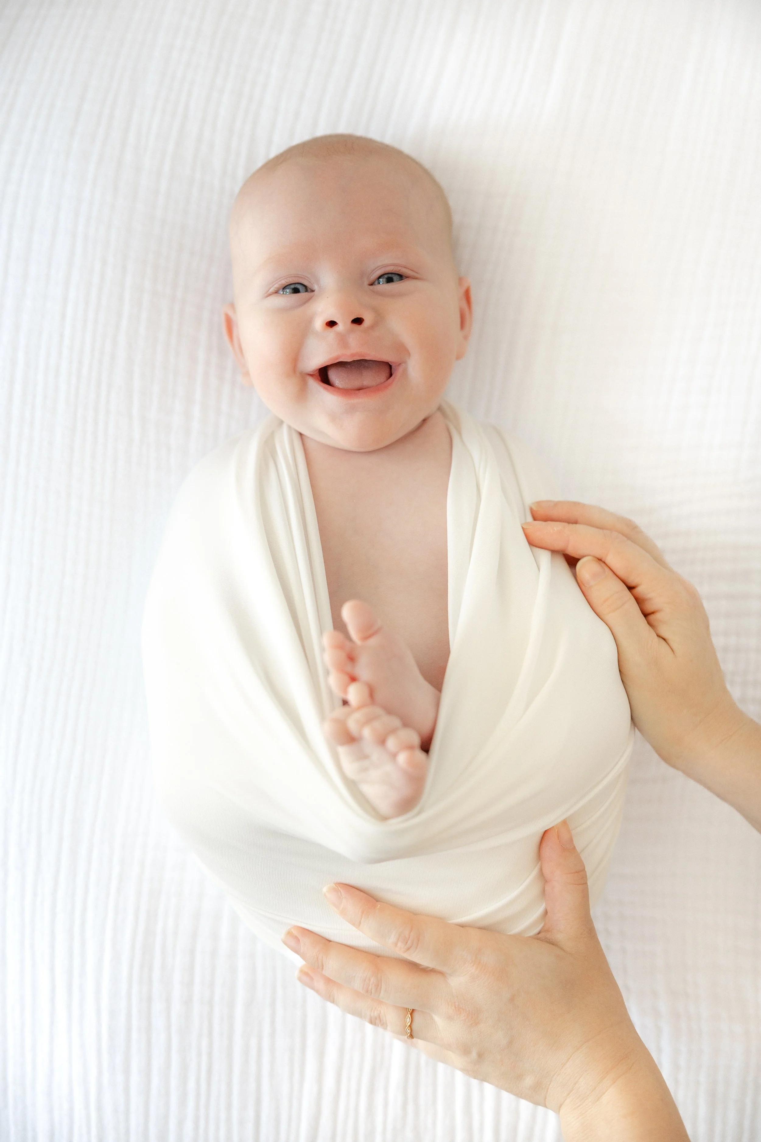 newbornphotosswaddled.jpg