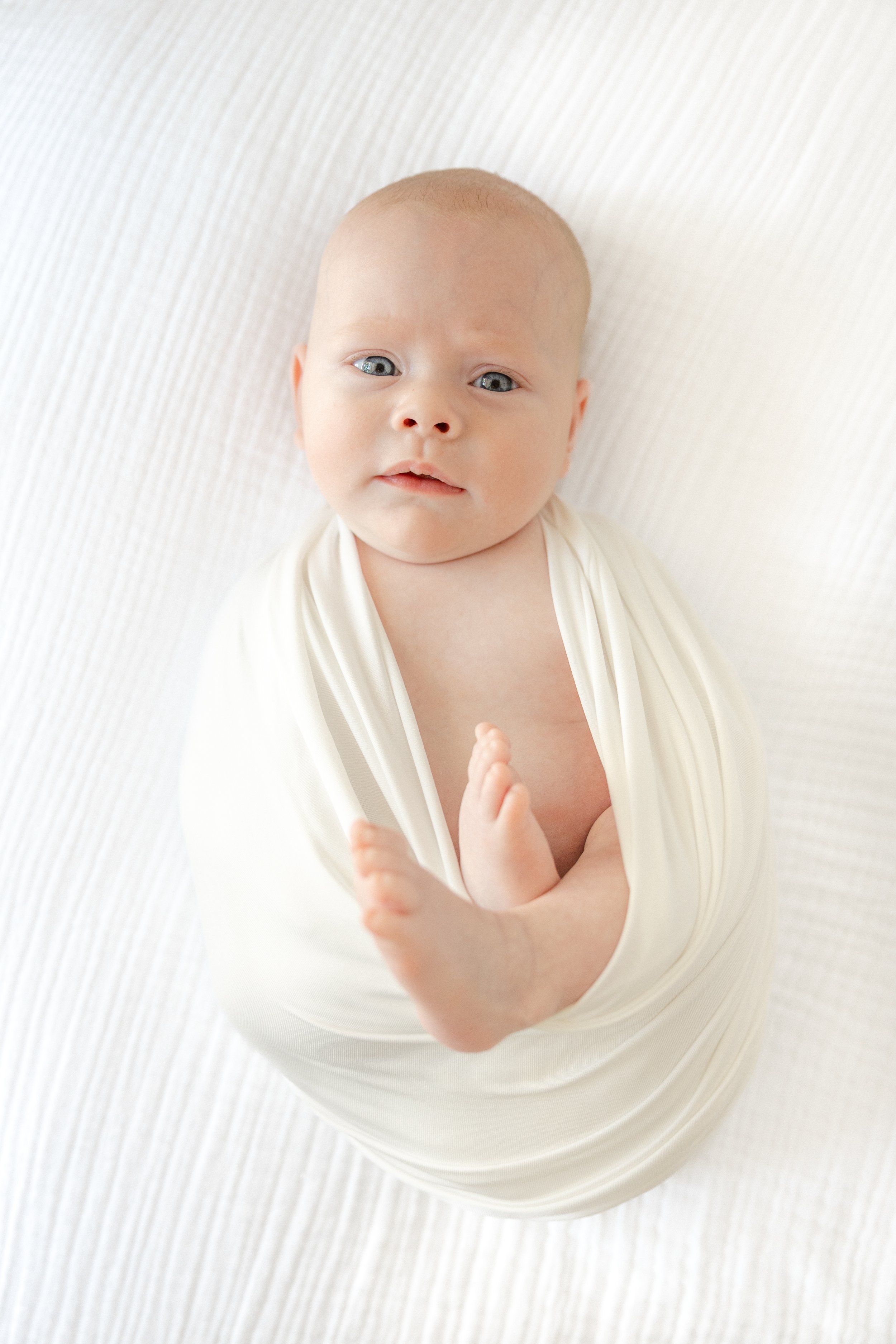 dallasnewbornphotoswaddled.jpg