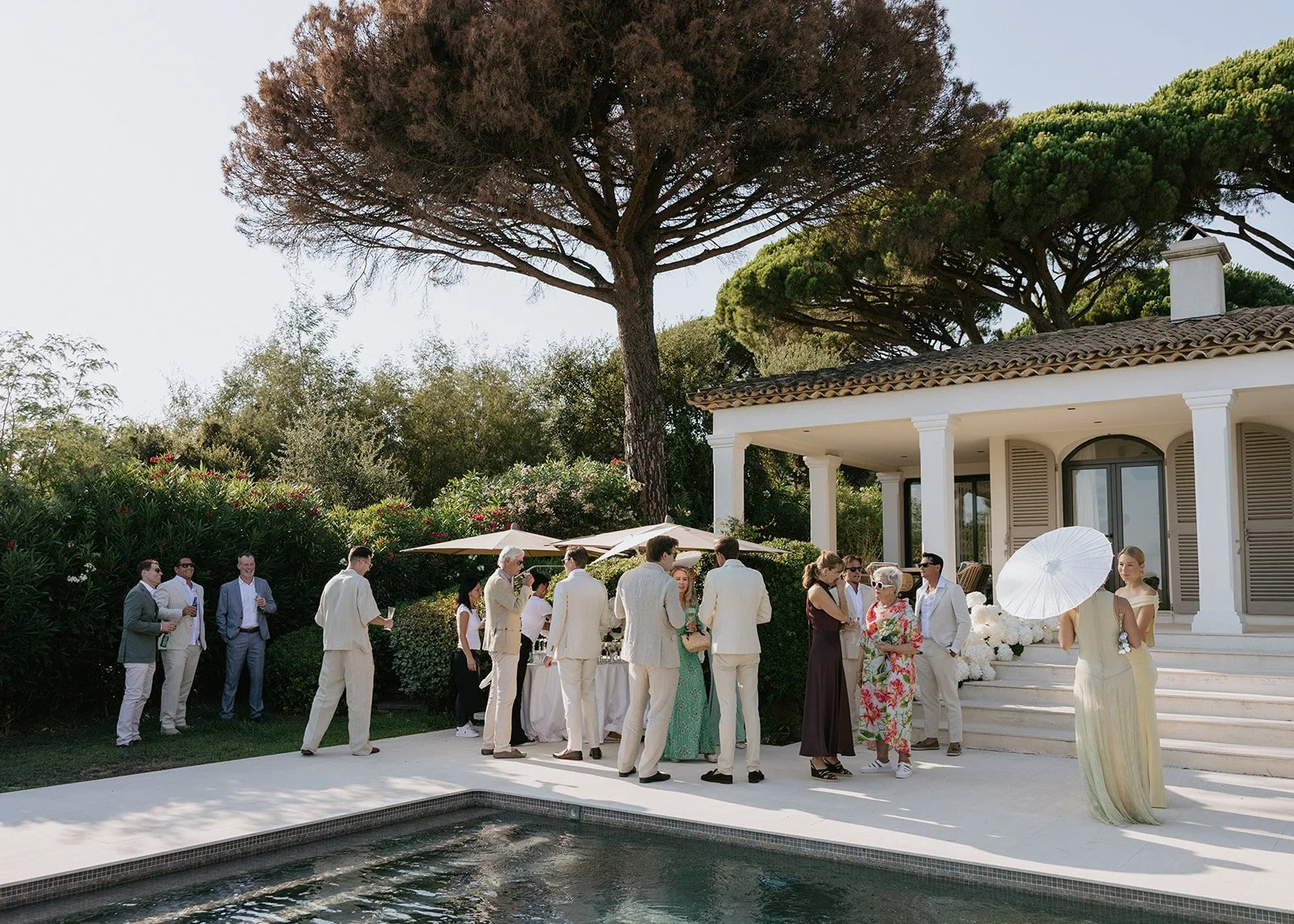 poolside-cocktail-hour-villa-guests.jpg