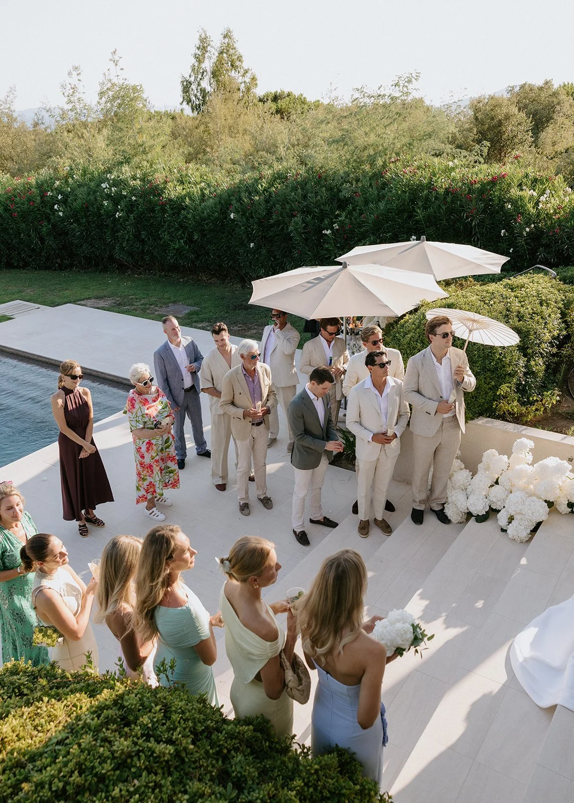 wedding-party-gathered-villa-staircase.jpg