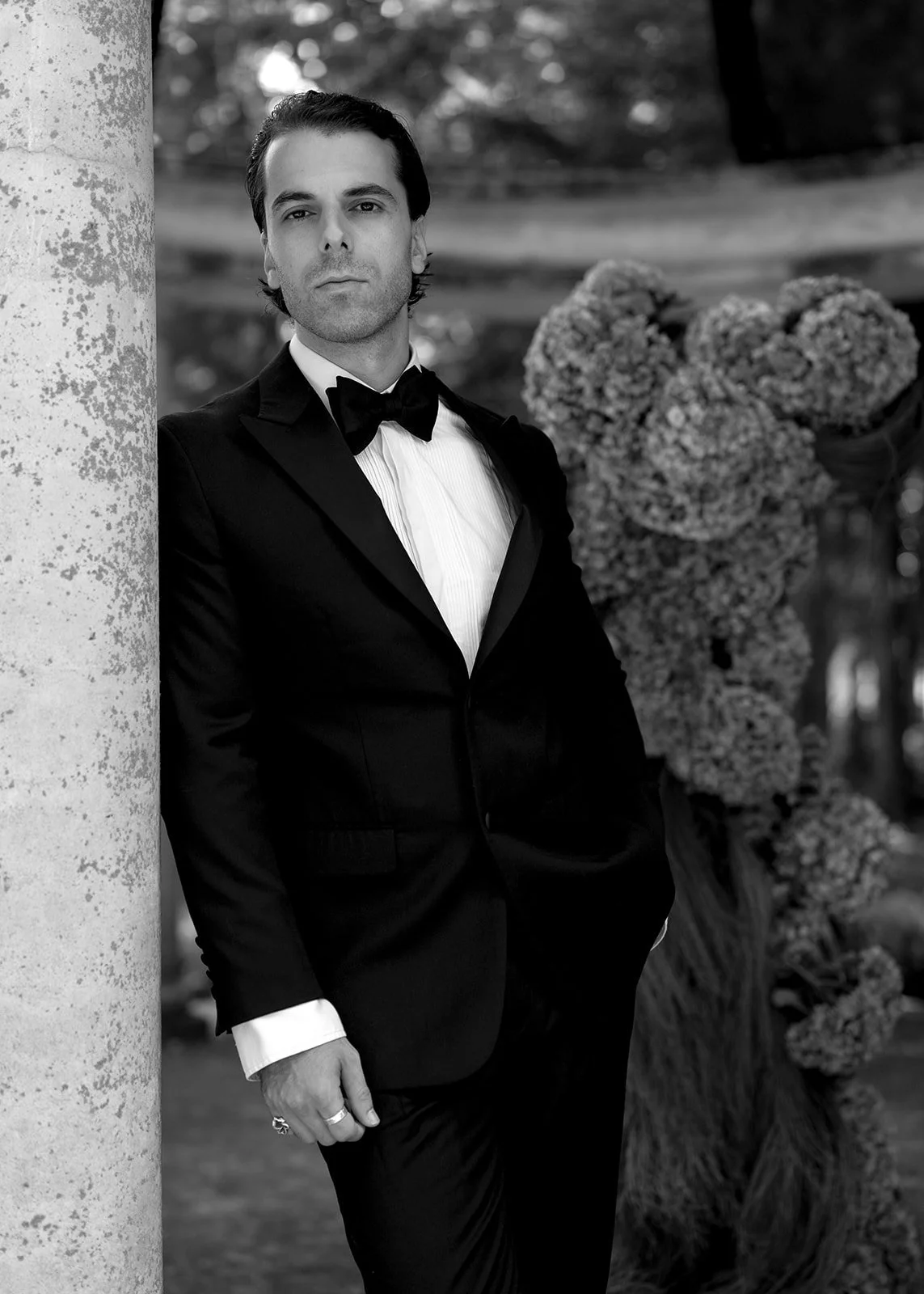 groom-portrait-black-white-floral-column.jpg