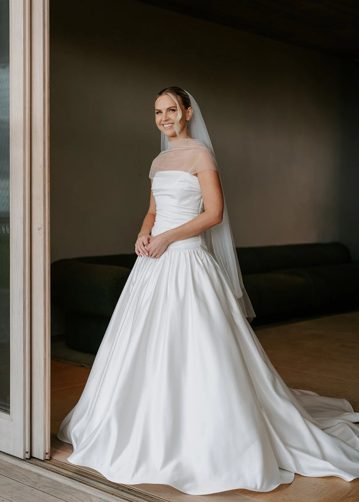 satin-ballgown-bridal-portrait-doorway.jpg