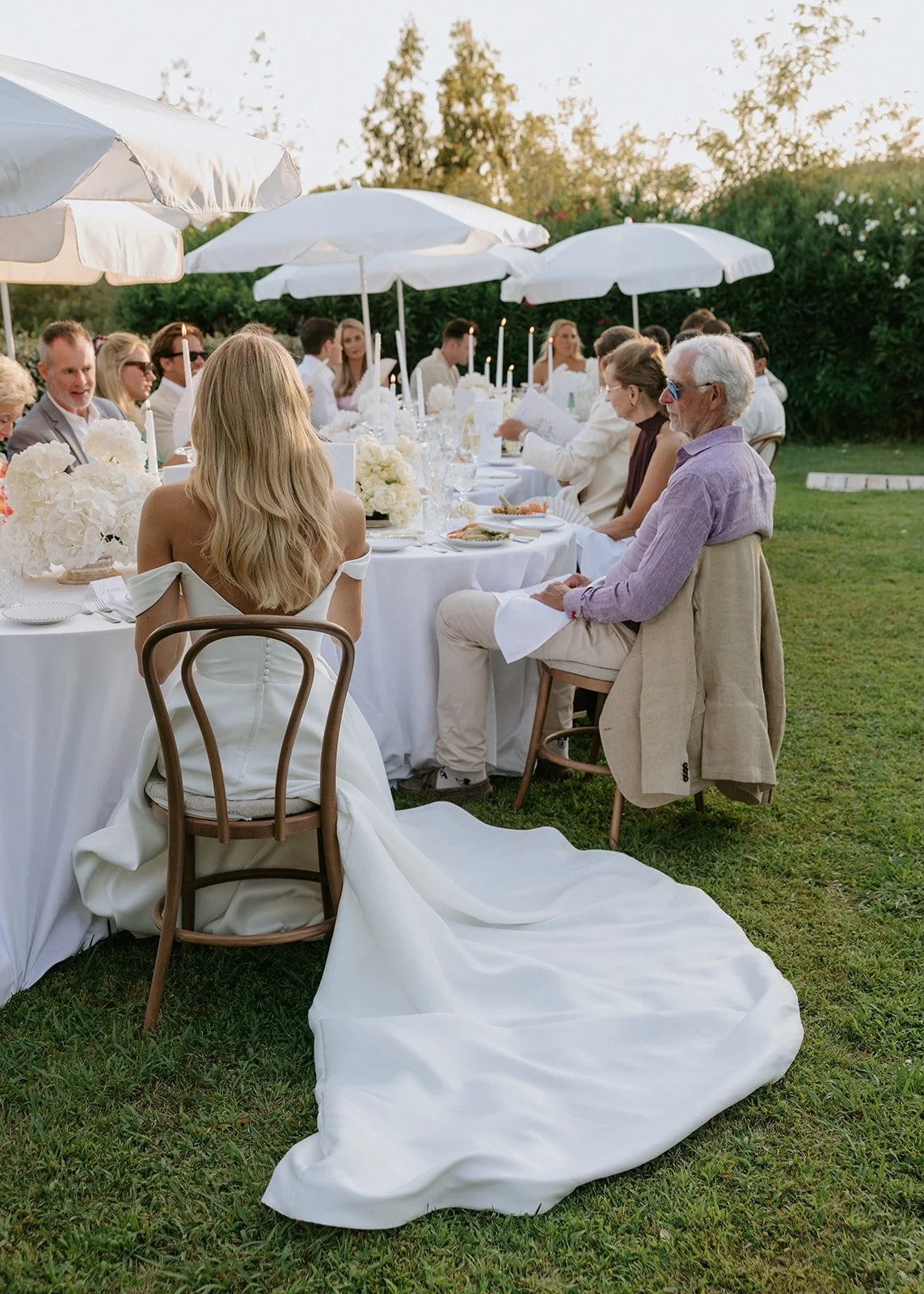 garden-reception-white-umbrellas-bride.jpg