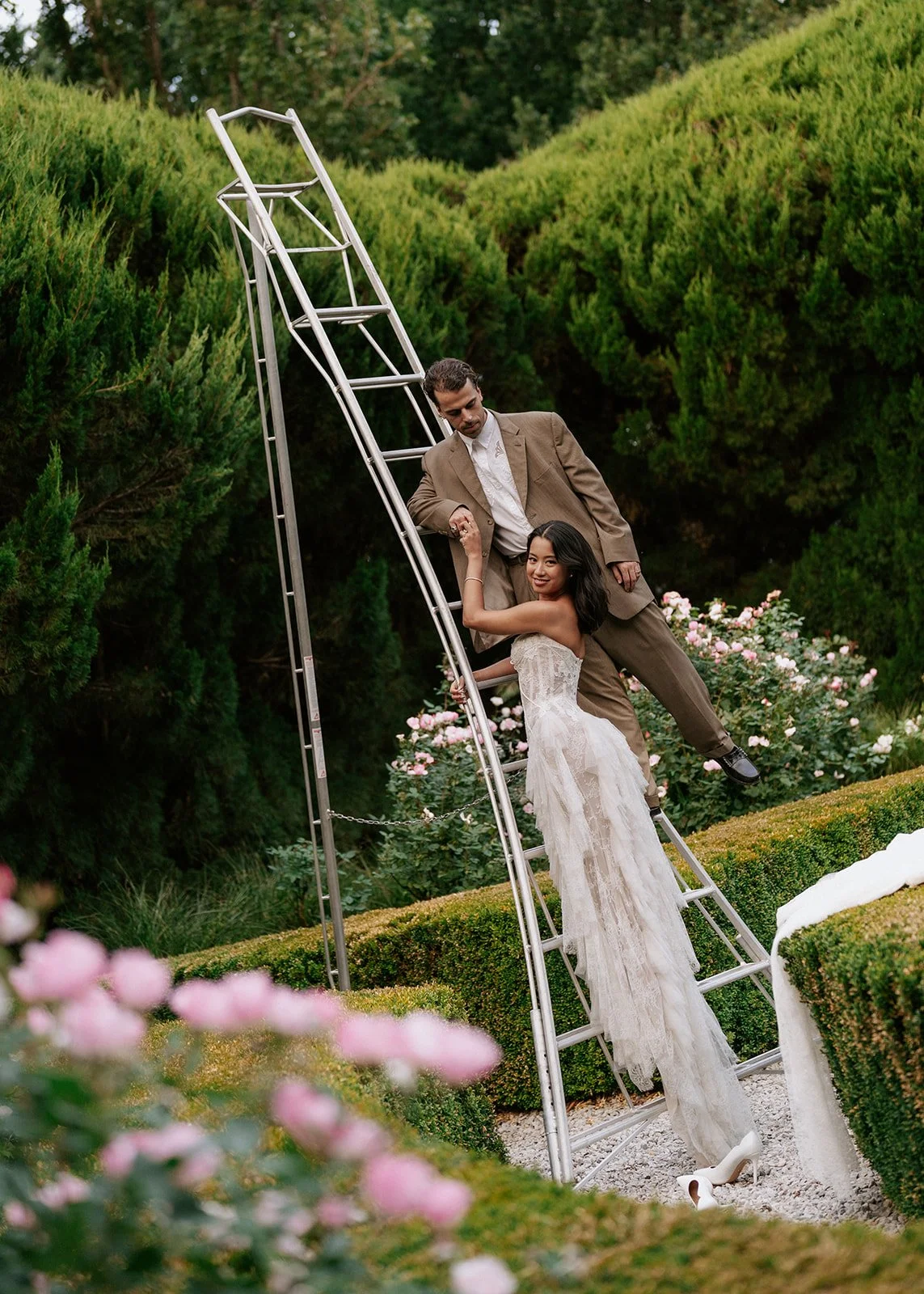 bride-groom-rose-garden-ladder.jpg