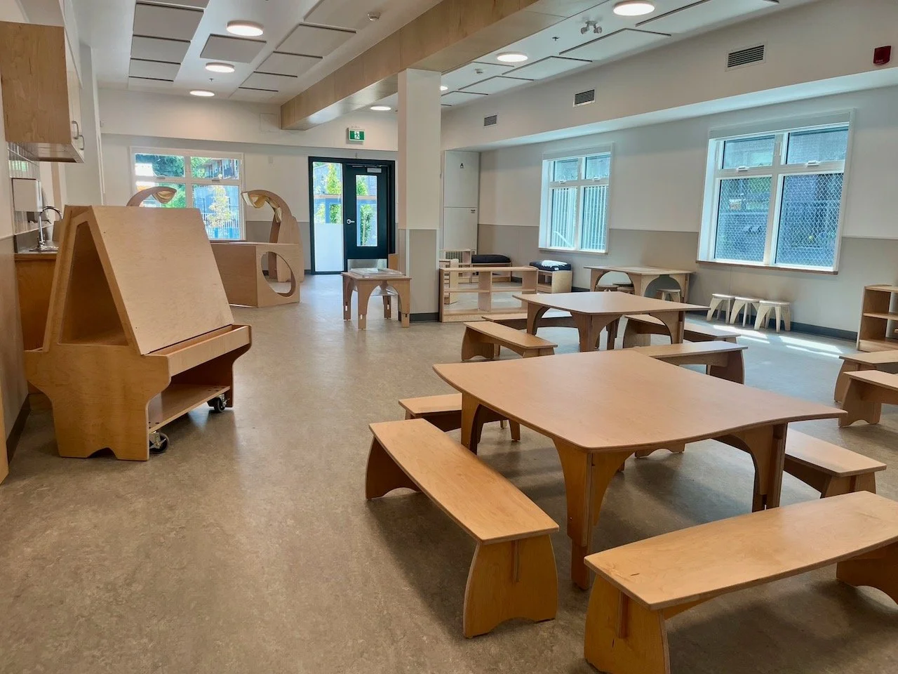 Preschool aged room with petite wooden furniture. Picture taken before toys, learning materials and decor were added)