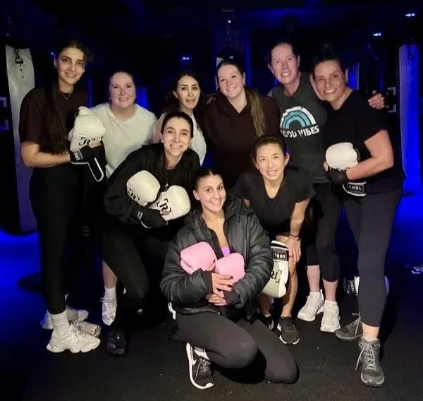 Group of women from Twig + Owl at boxing class for a team bonding event.
