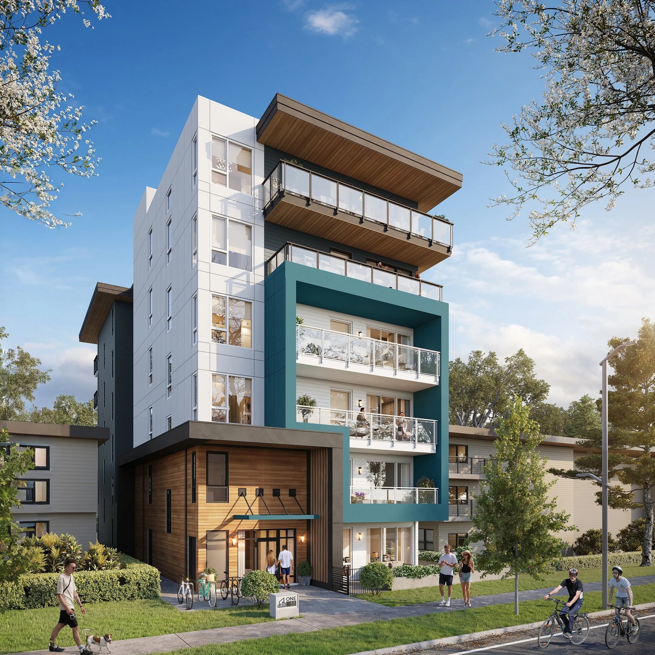 Twig + Owl's latest childcare centre in Lower Lonsdale is housed within a modern multi-story apartment building with balconies, surrounded by green trees and people walking.