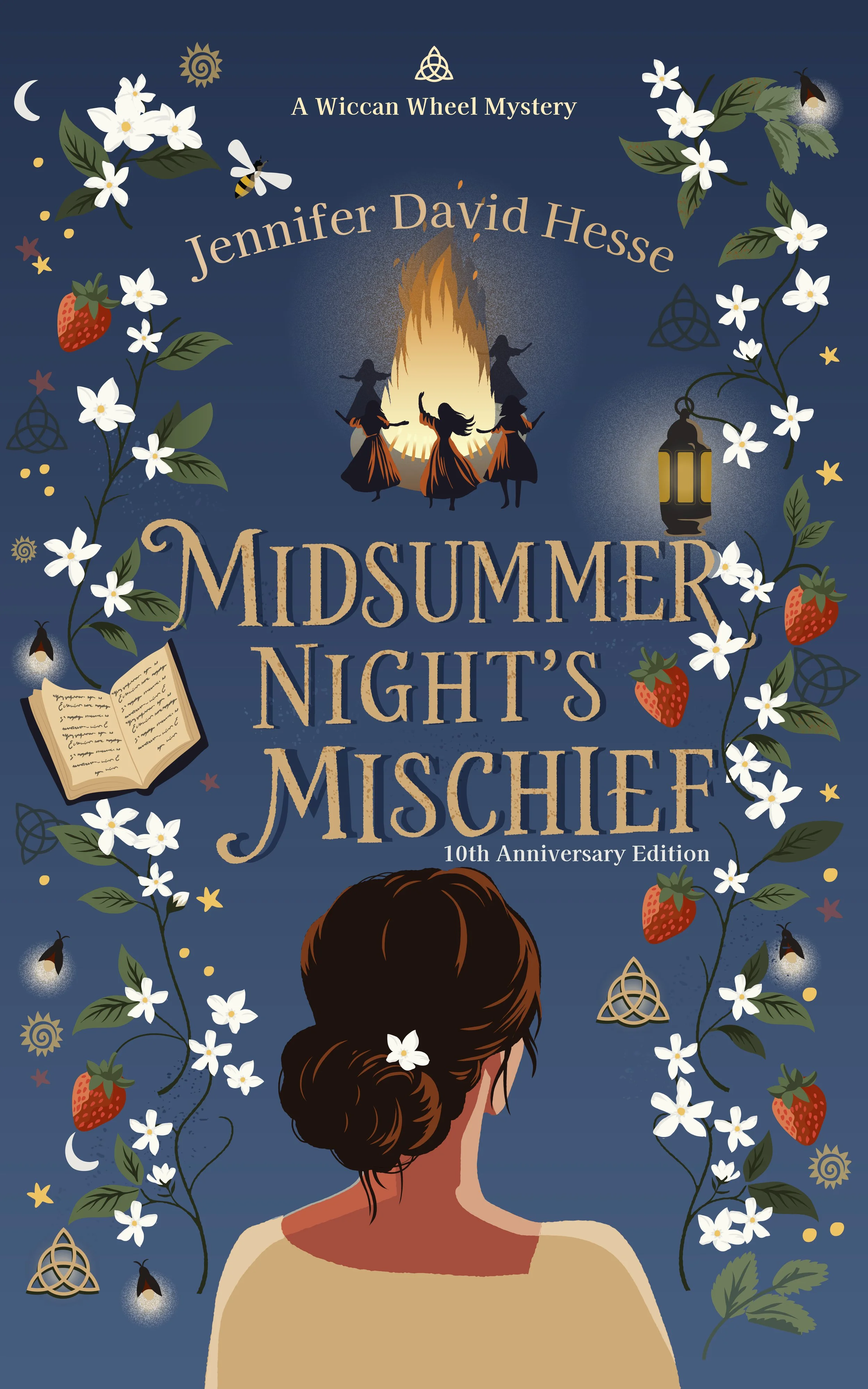 In the foreground is a young brunette woman in profile. This is Keli Milanni over looking a scene of shadowy women dancing around a bonfire. The scene is bordered by symbols of witchcraft and summertime, including jasmine, strawberries and fireflies.