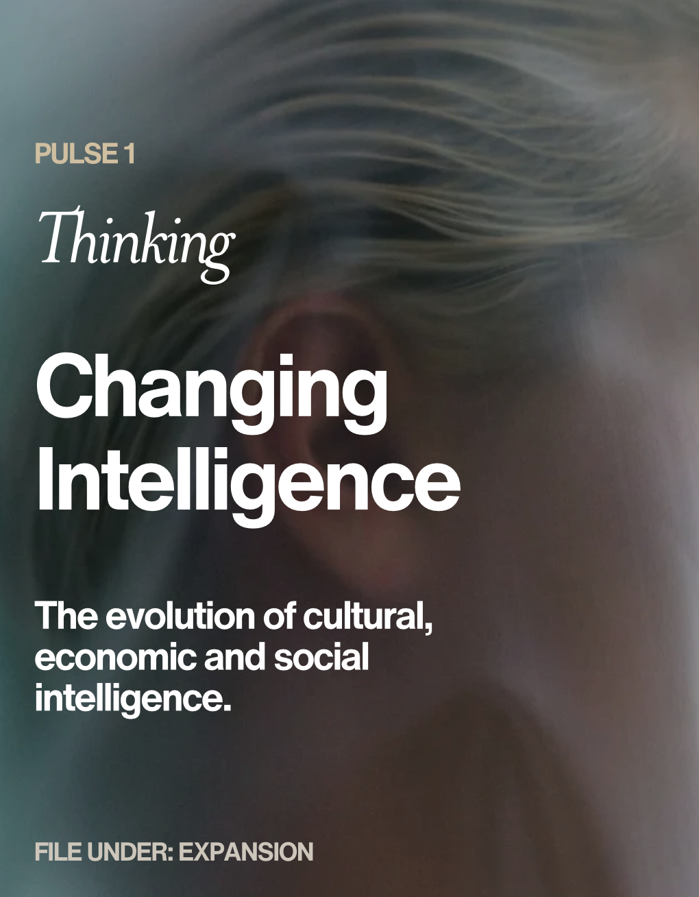 Abstract image with text about changing intelligence and cultural, economic, and social evolution.