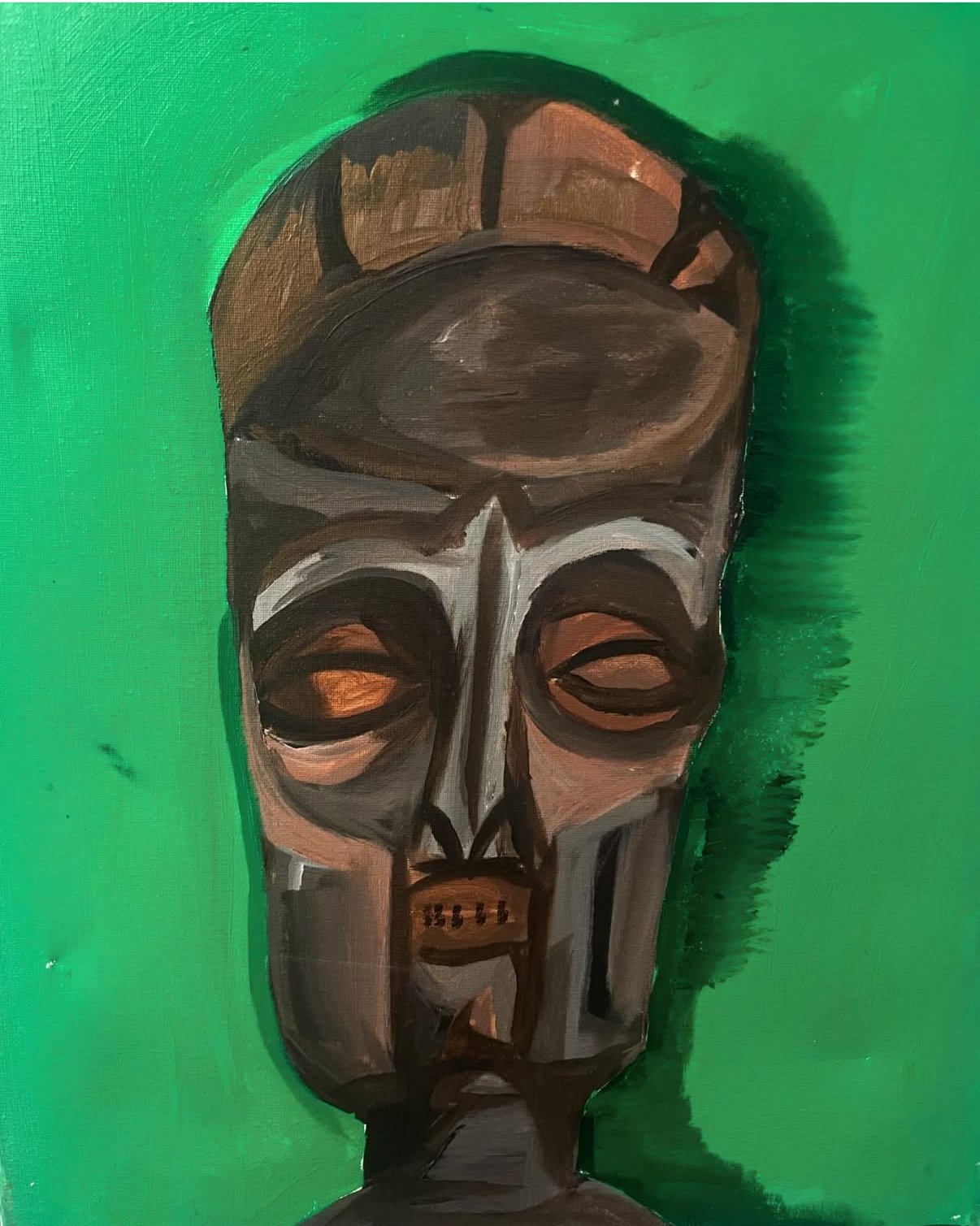 Painting of a stylized African tribal mask with brown, gray, black, and white colors on a green background.