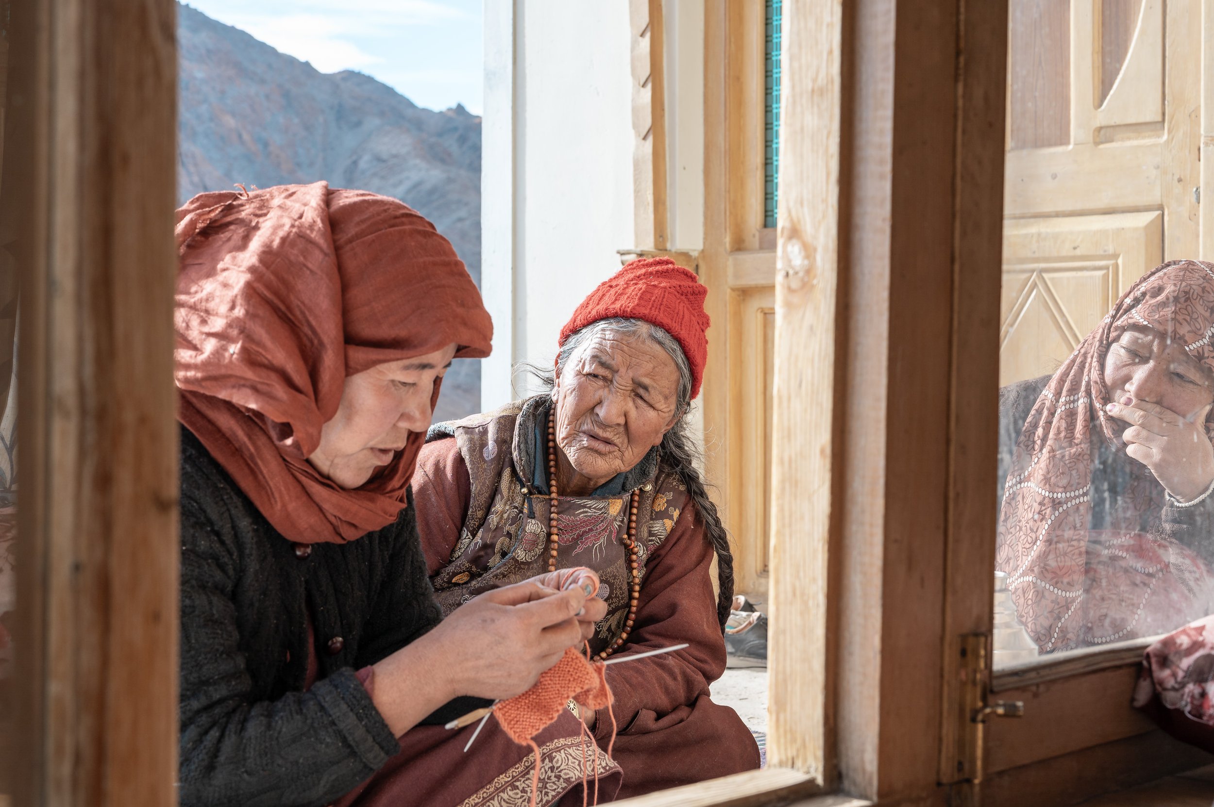 ladakh-women-knitting-window-elder-prayer-beads-nang-village-ladakhi-life.jpg