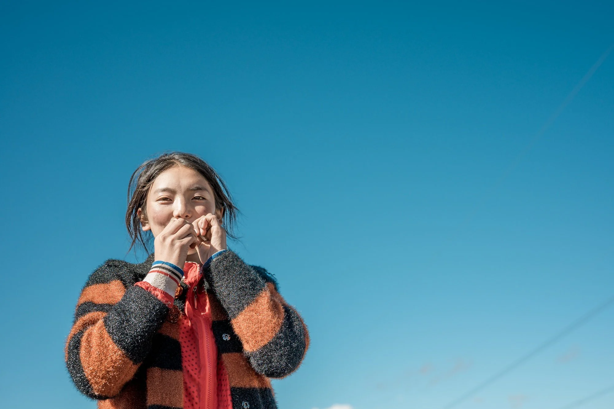 tibetan-girl-portrait-sky-luoge-kham-tibet-eleanor-moseman.jpg