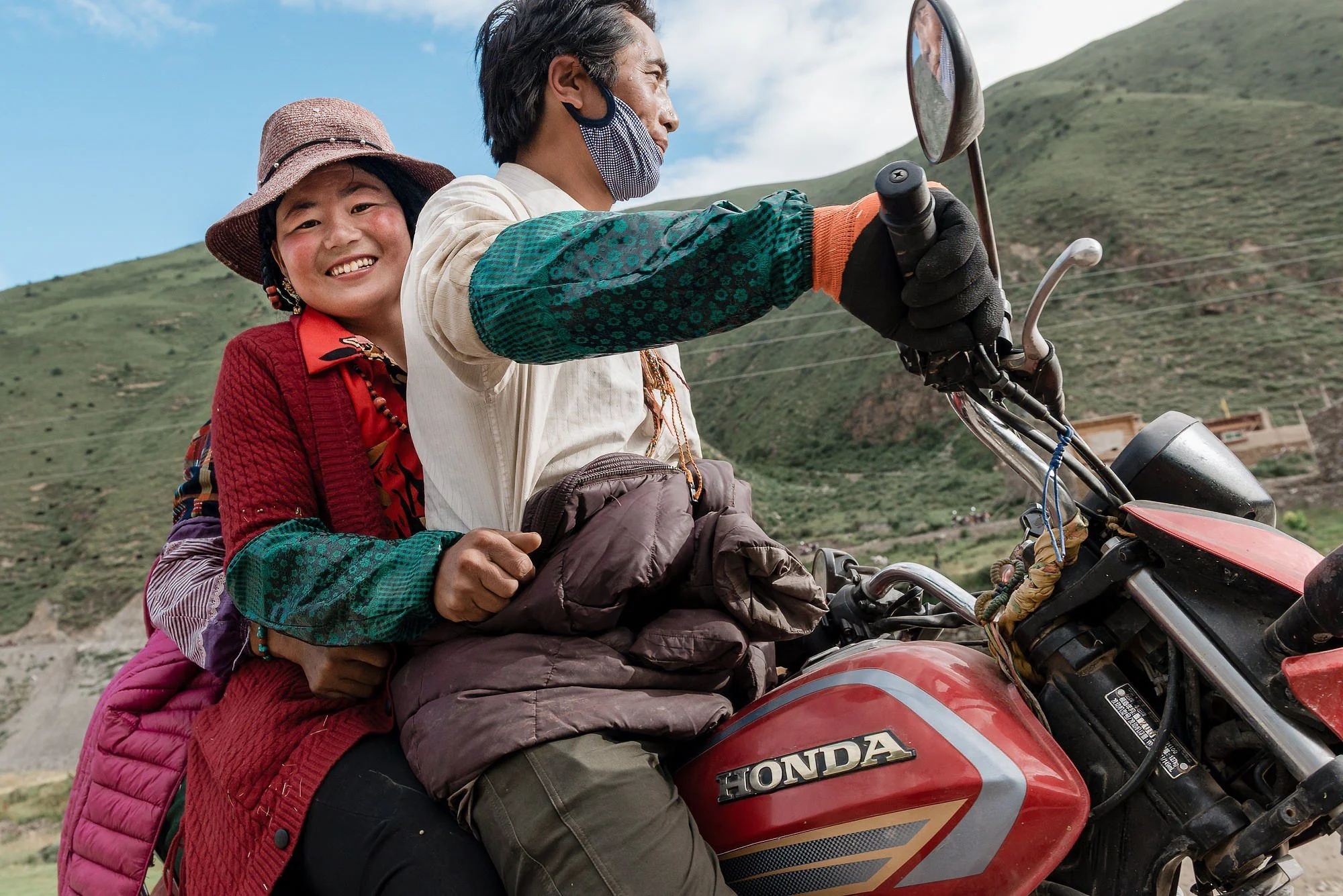 tibetan-couple-motorcycle-khana-village-eleanor-moseman.jpg