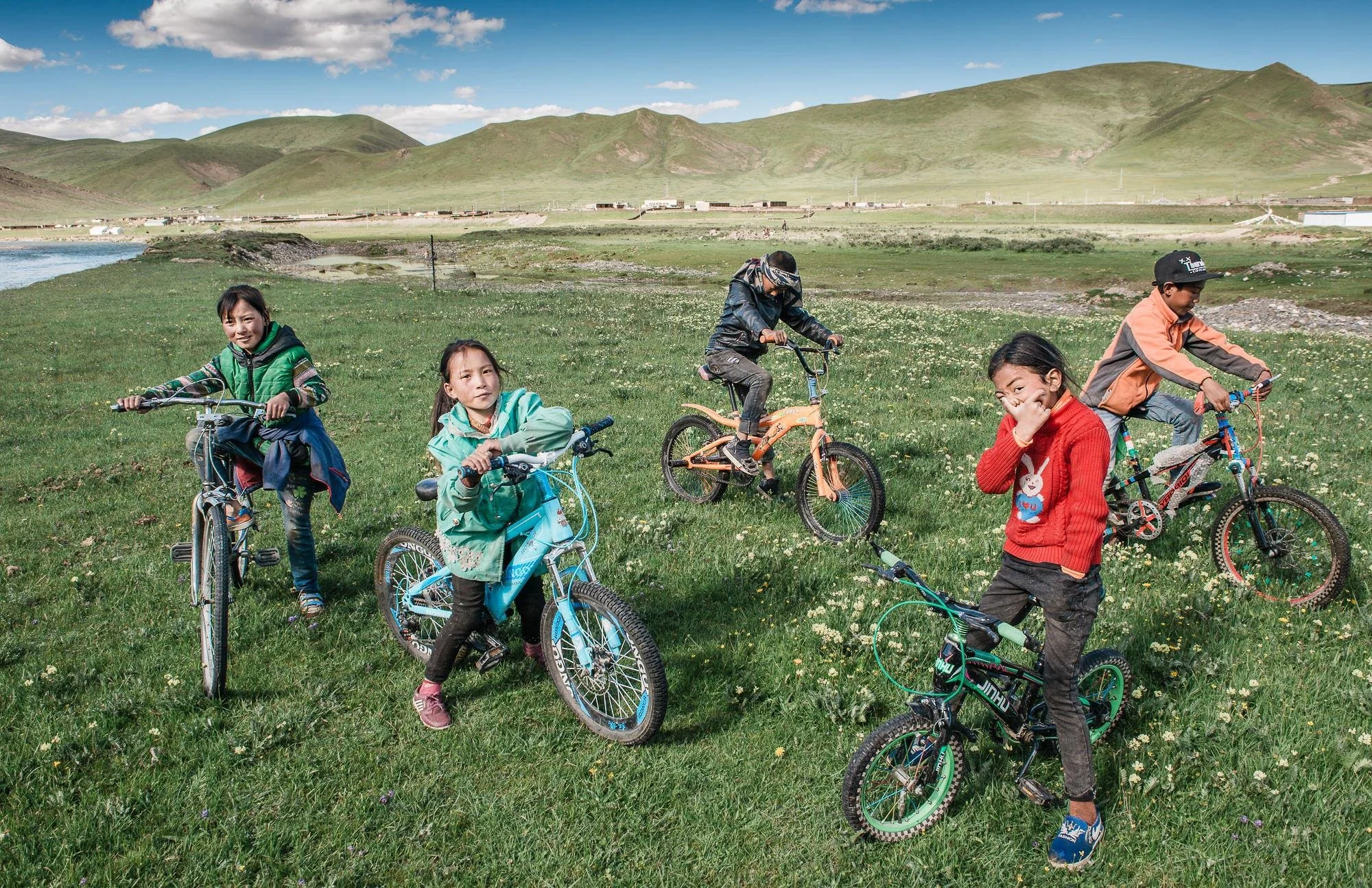 tibetan-children-bicycles-grassland-eastern-tibet-eleanor-moseman.jpg