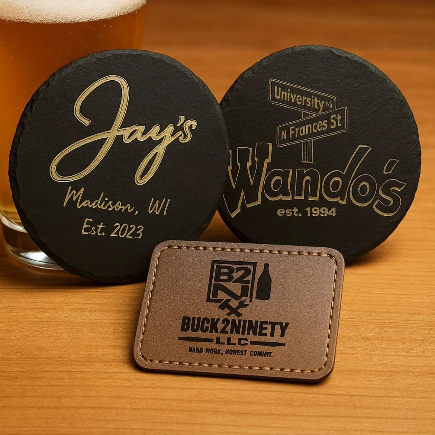 Your brand deserves more than paper labels and plastic promo.
Engraved merch gives it weight &mdash; something customers can hold, keep, and remember.

From coasters to signage, Buck2Ninety helps local businesses turn their identity into lasting prod