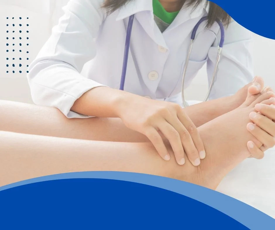 Healthcare professional examining a patient's leg with a stethoscope draped around their neck.