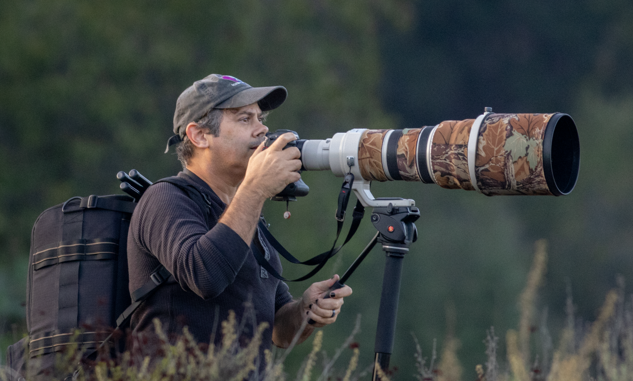 Multi-awarded photographer Edi Roque caught in action somewhere around the world.