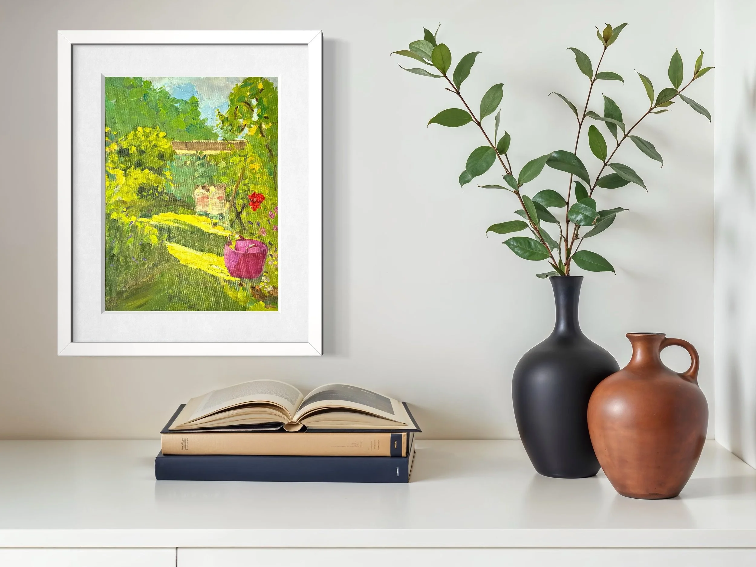 Interior scene featuring a framed garden landscape painting, painted in oil,  on the wall. The painting captures a flash of morning light as it illuminates its own path across the grass, drawing attention to a pink pot which sits purposefully.