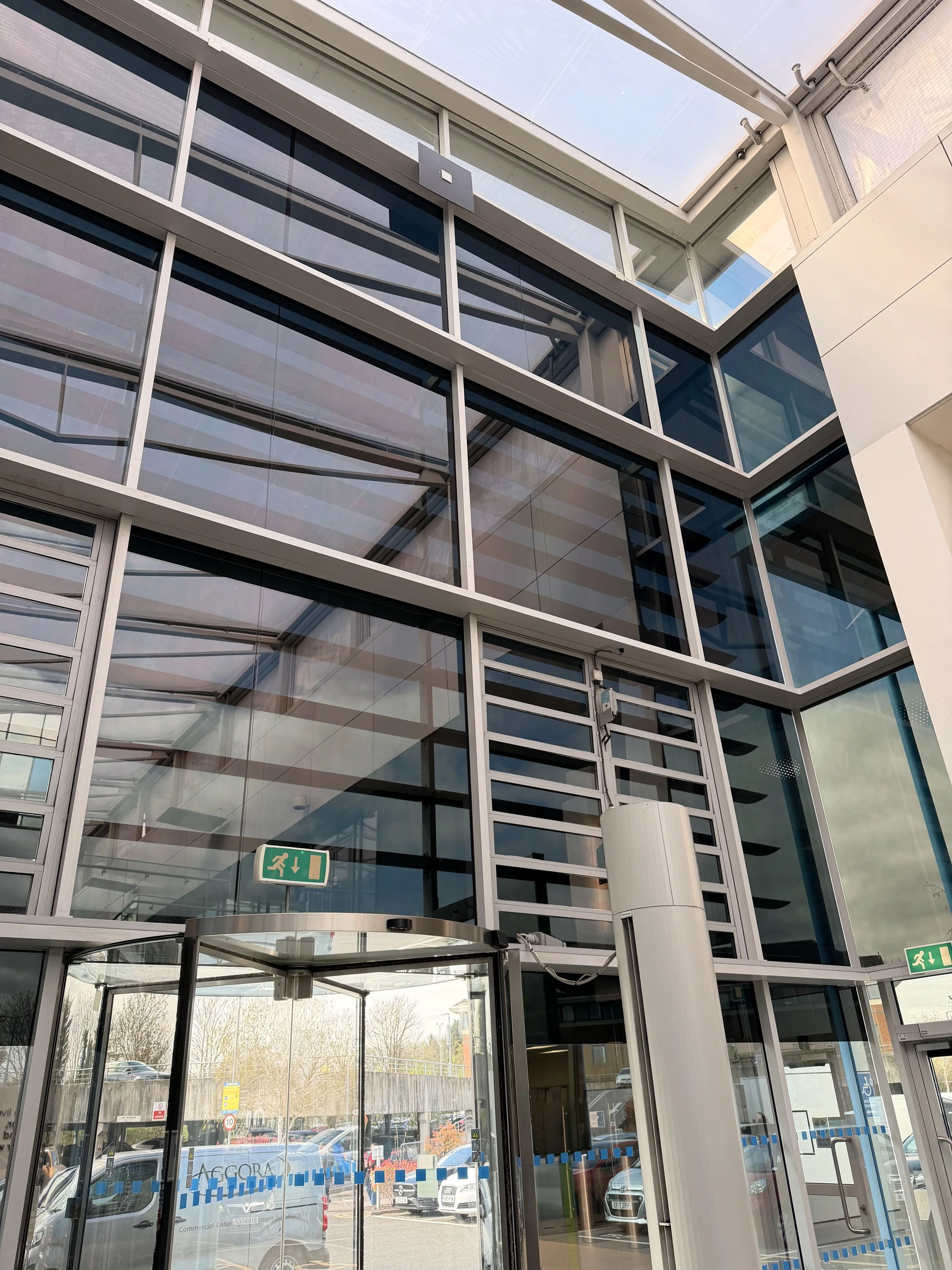 office reception glass tinted in a window film for privacy and heat reduction.