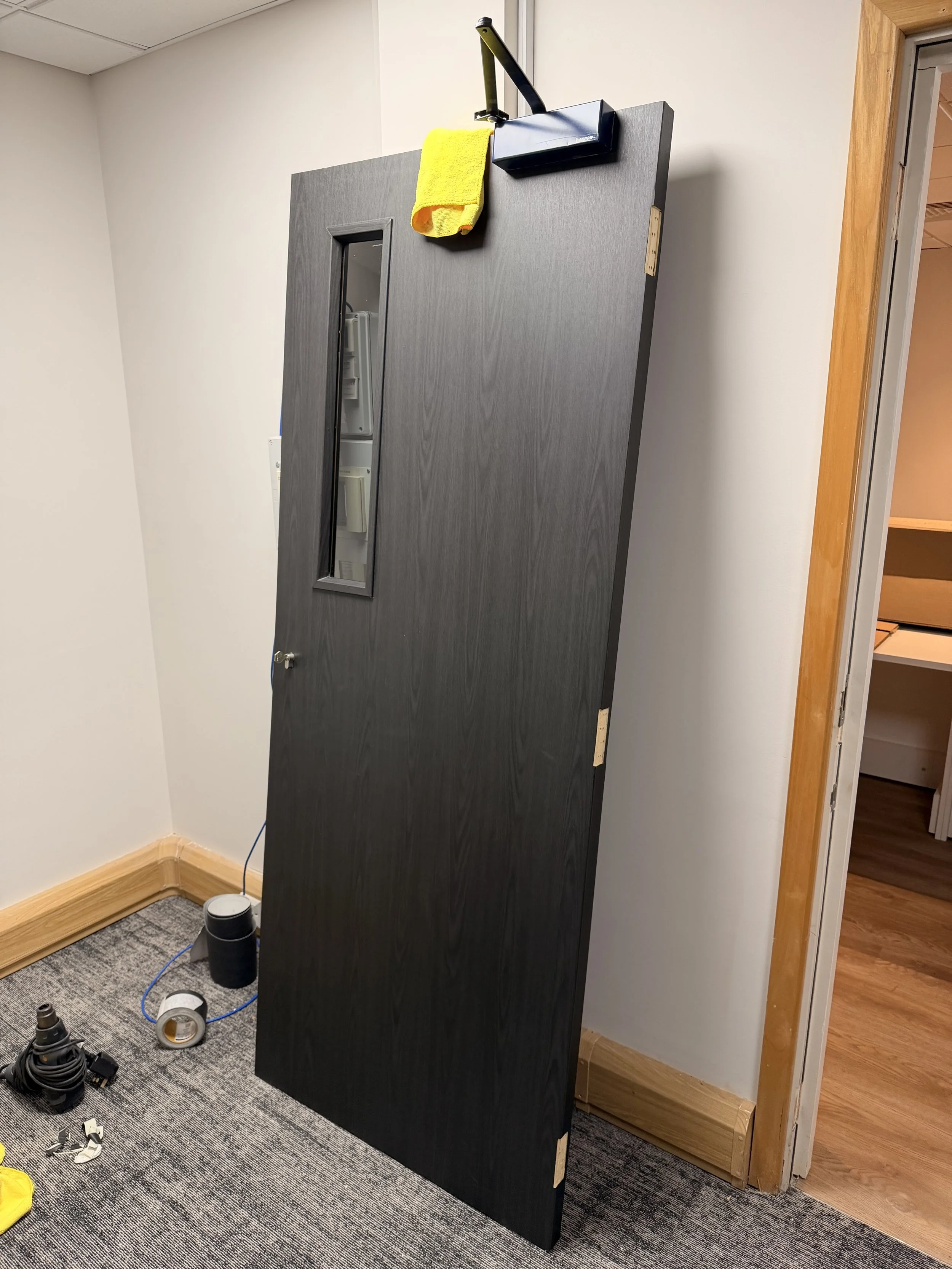 office door refurbished in architectural vinyl.