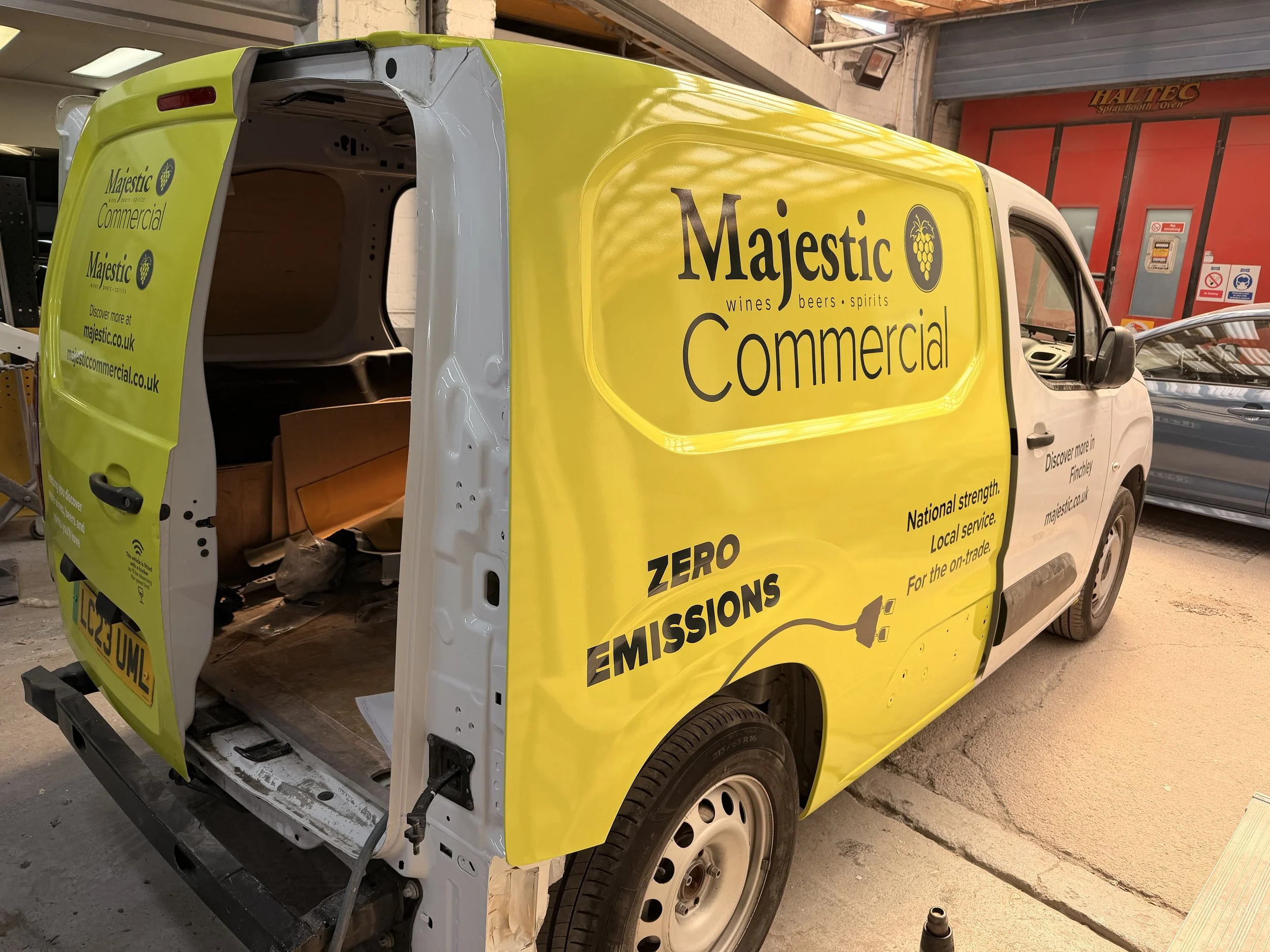 drivers side crash repair for majestic wines full side wrap.