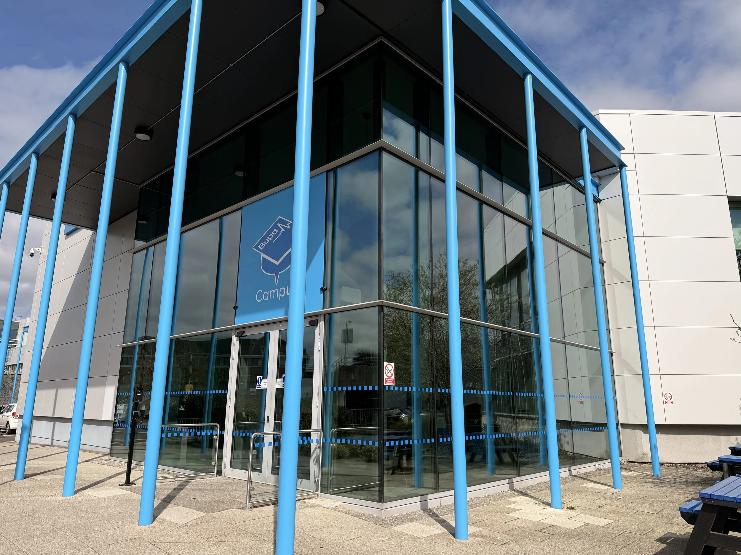 office reception glass tinted in a window film for privacy and heat reduction.