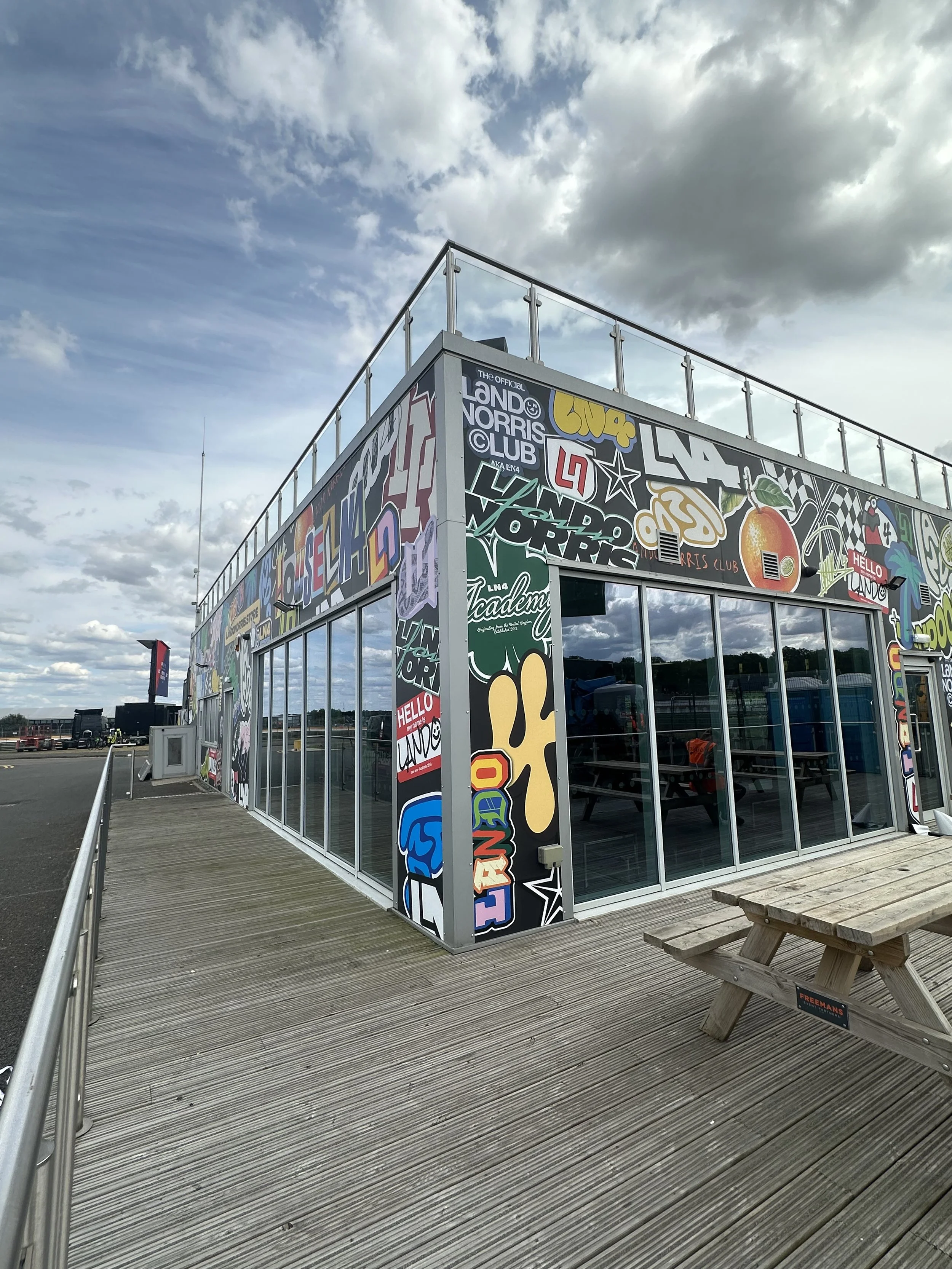 an exterior building wrap for land Norris at the Silverstone grand prix.