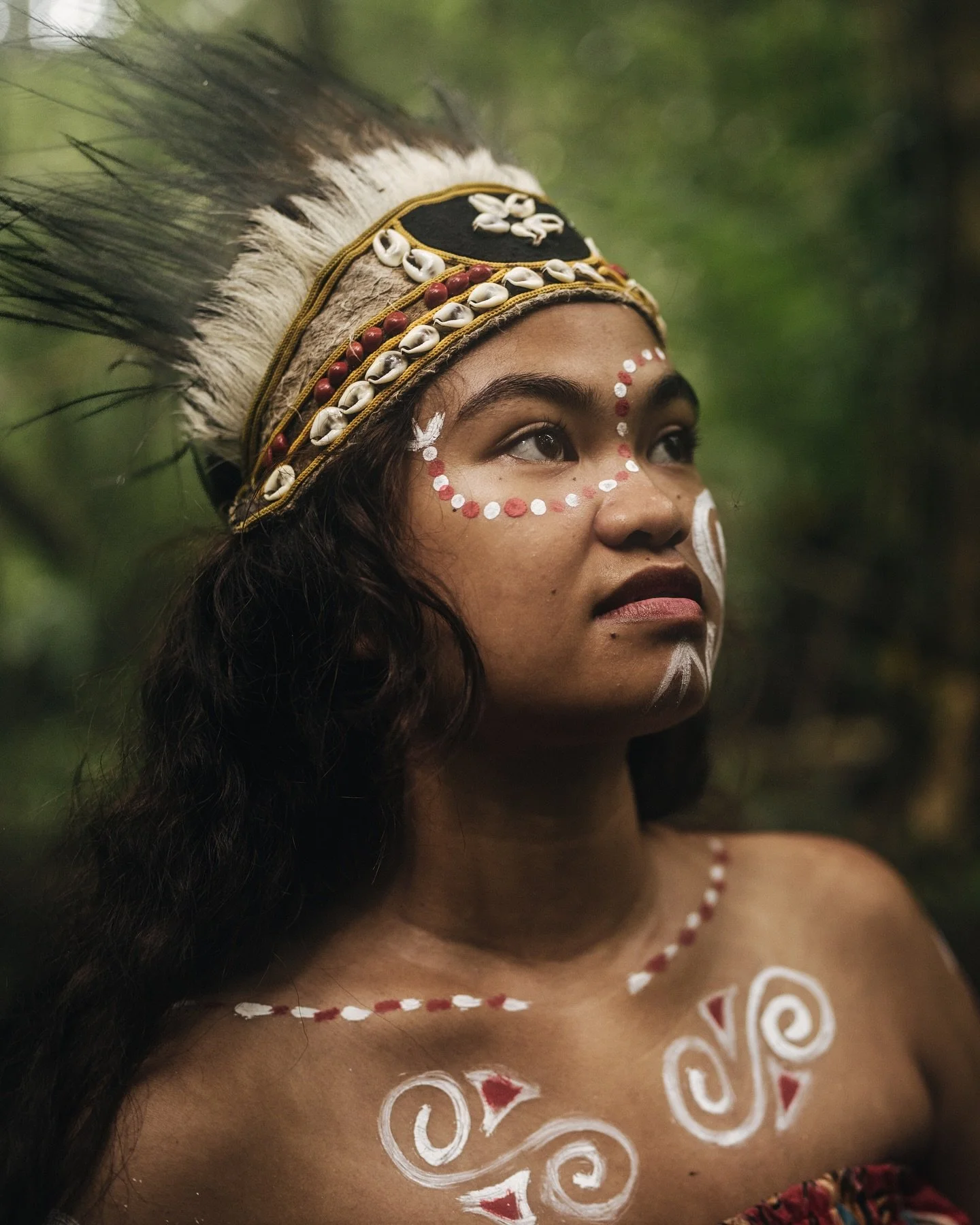 Ususally I am not primarily a portrait photographer when there is epic around but when our local guides showed up in traditional clothing that quickly changed.

Watching them slowly walk through their ancient forest was a really magical experience th