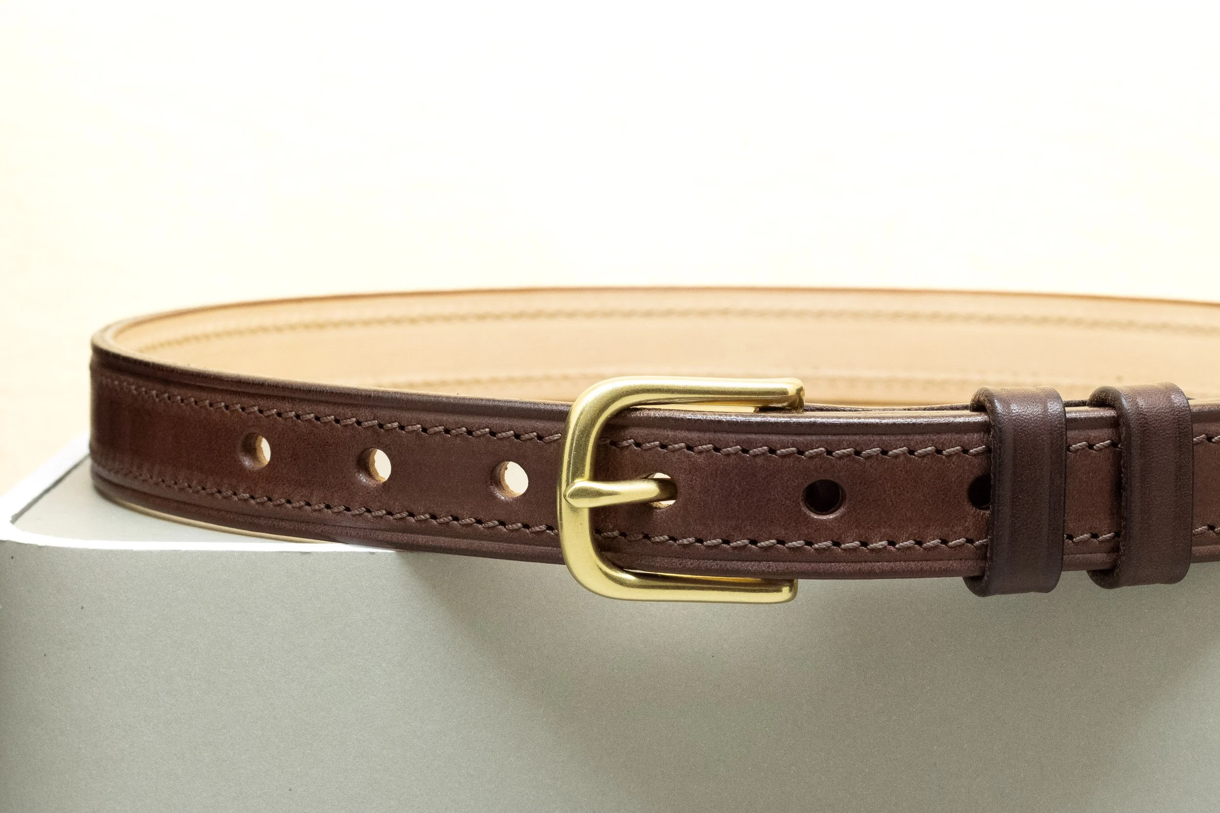 Dark brown bridle leather belt with matching brown stitch and half brass buckle 25mm