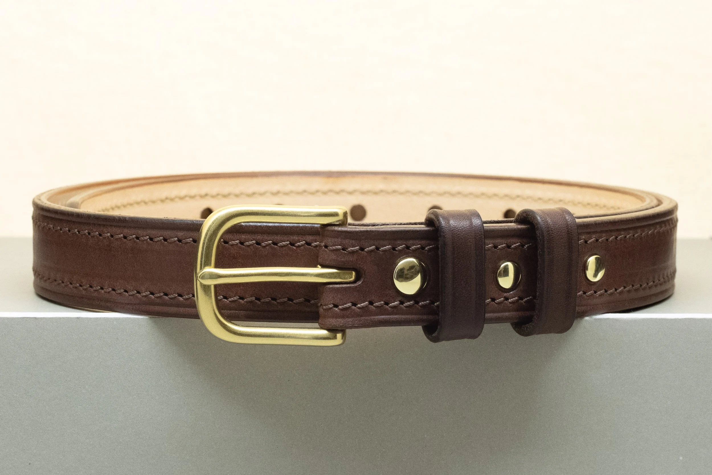 Dark brown bridle leather belt with matching brown stitch and half brass buckle 25mm