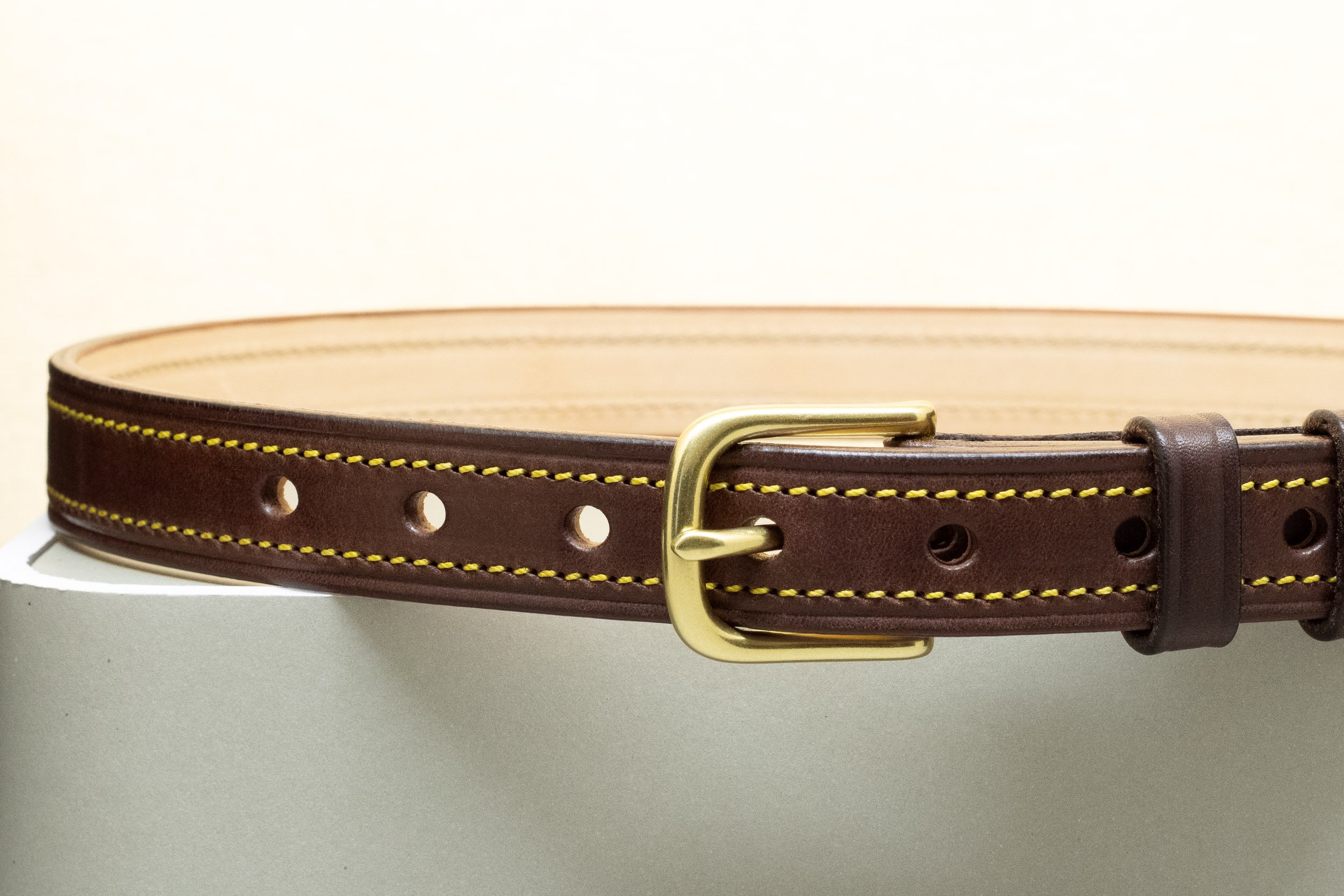 Dark brown bridle leather belt with yellow stitch and half brass buckle 25mm