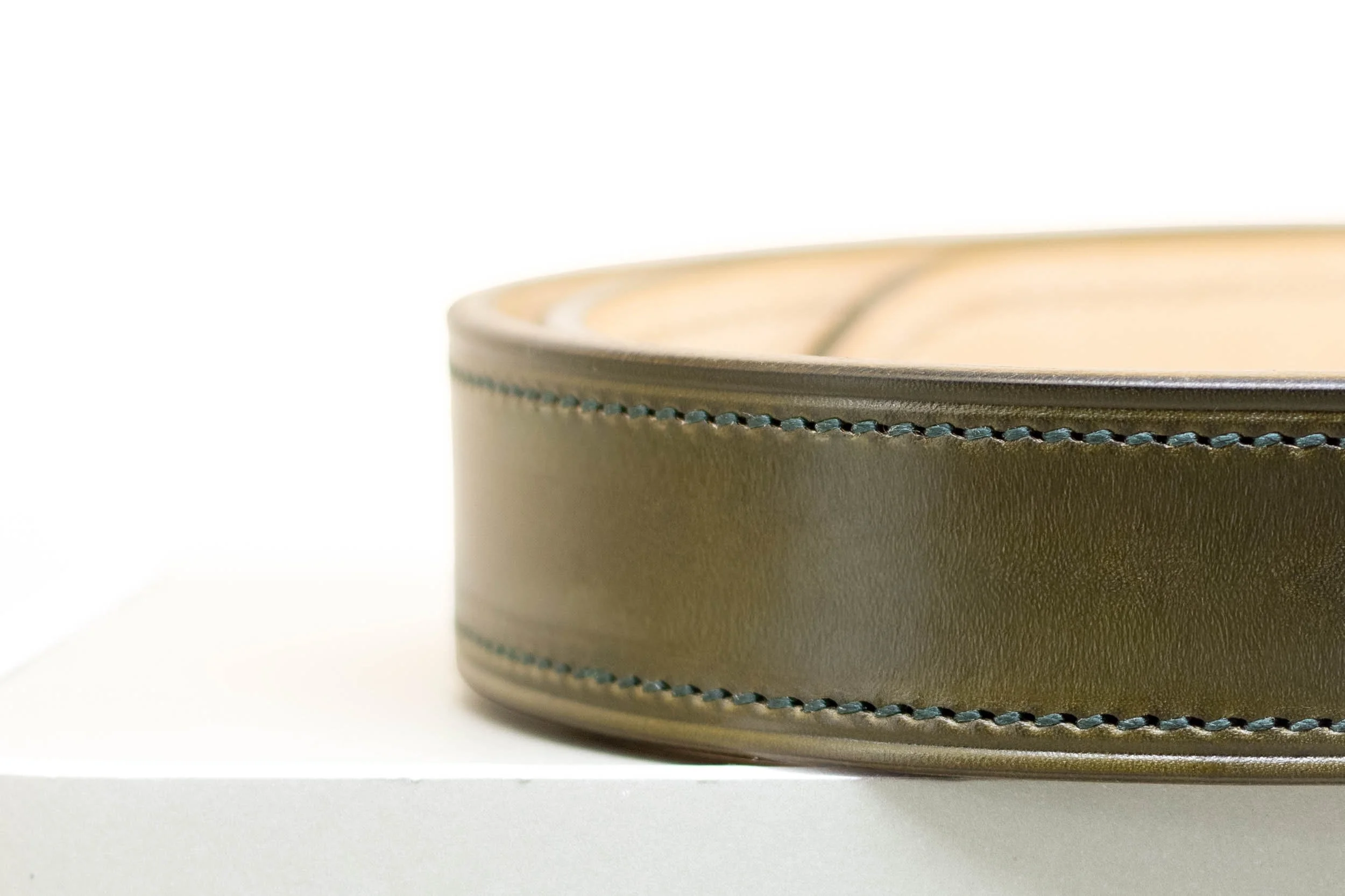 Green leather belt with matching green stitch and half brass buckle 38mm