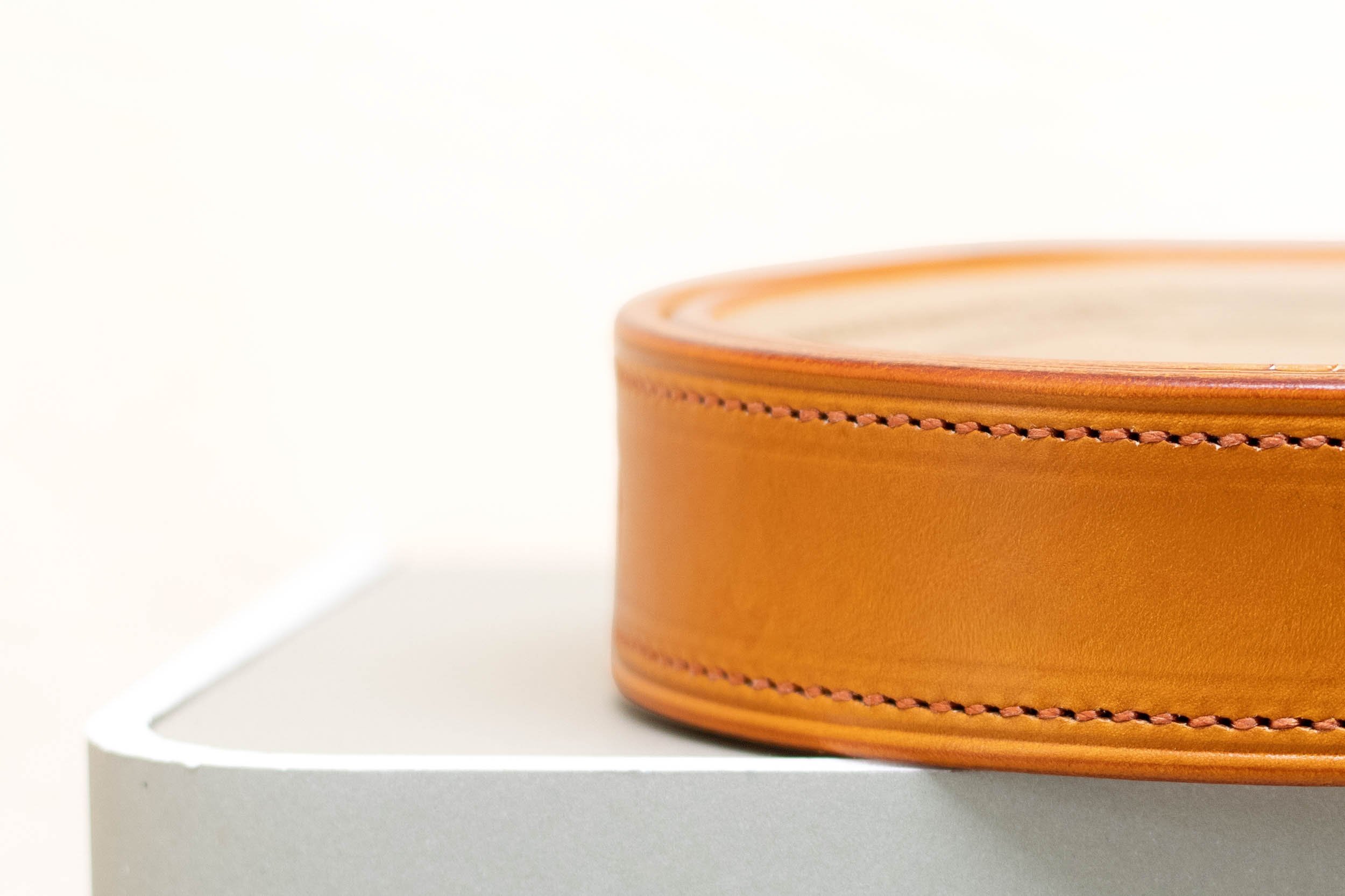 Orange leather belt with matching orange stitch and half brass buckle 38mm