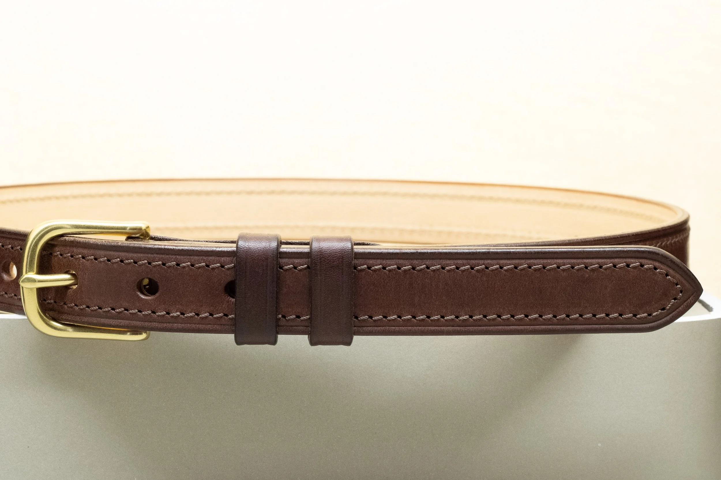 Dark brown bridle leather belt with matching brown stitch and half brass buckle 25mm
