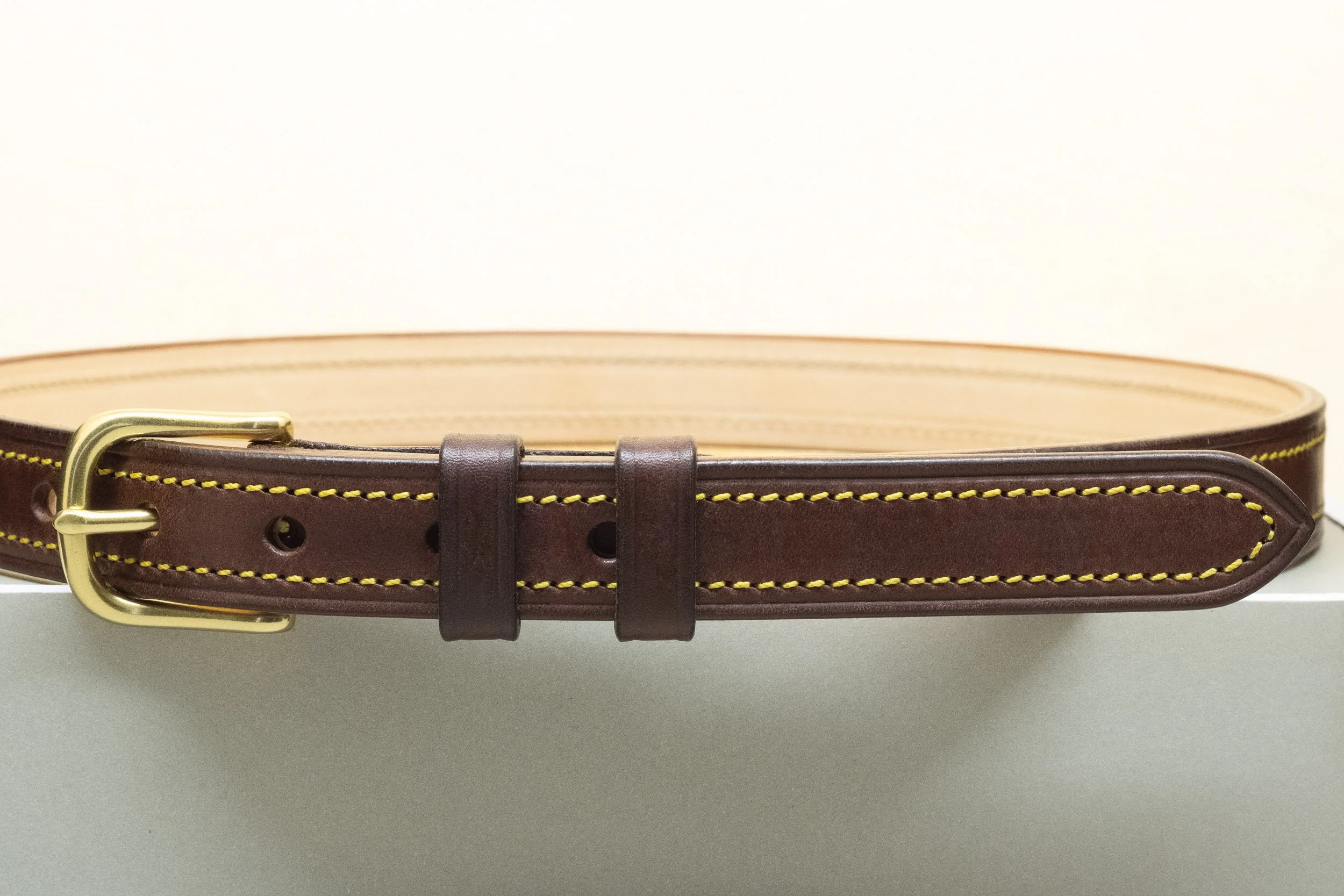 Dark brown bridle leather belt with yellow stitch and half brass buckle 25mm