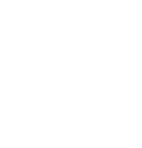 A person using a handheld showerhead to rinse.