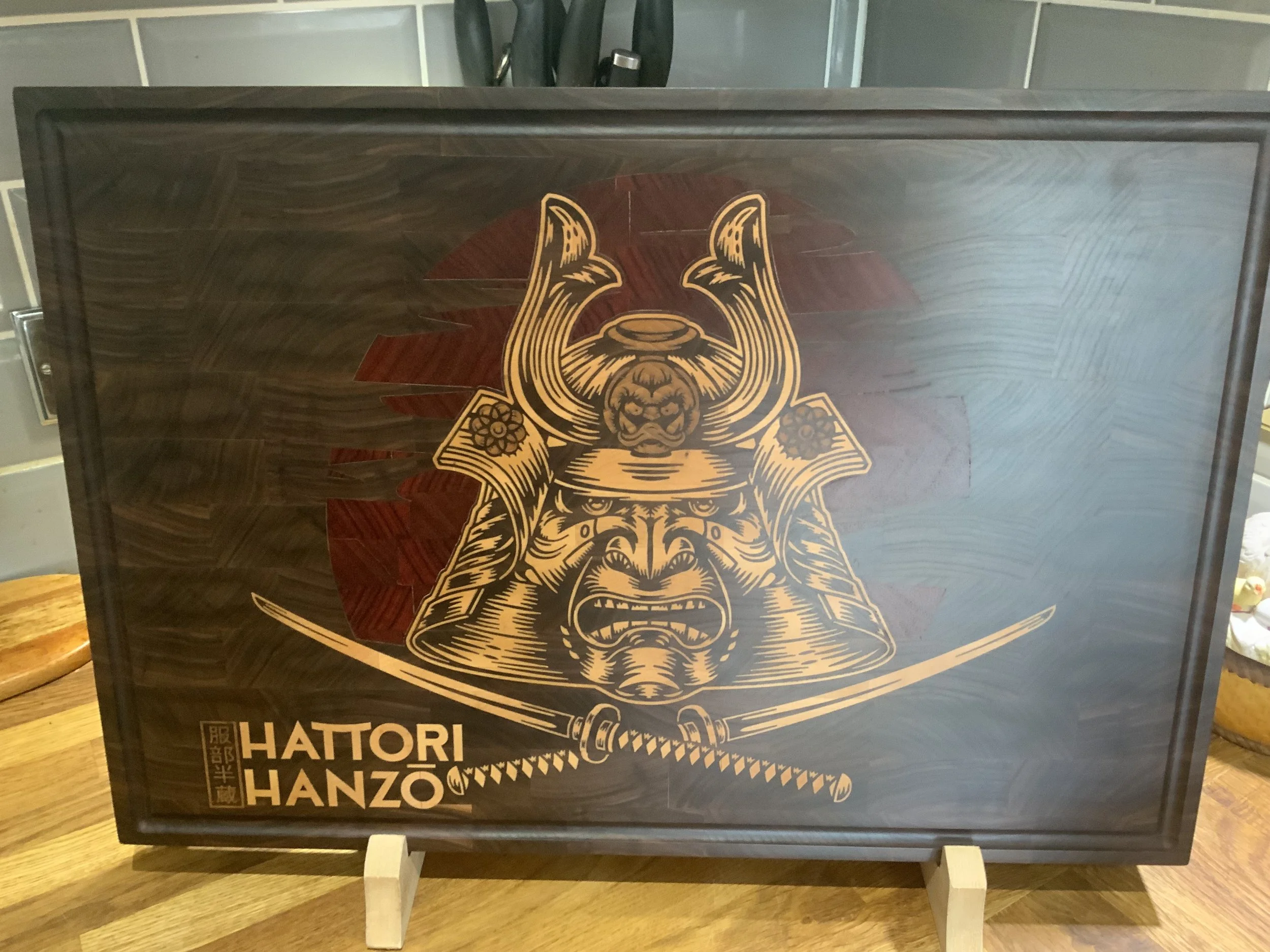 Custom Made Hattori Hanzo Vcarved wood inlayed Cutting Board.
