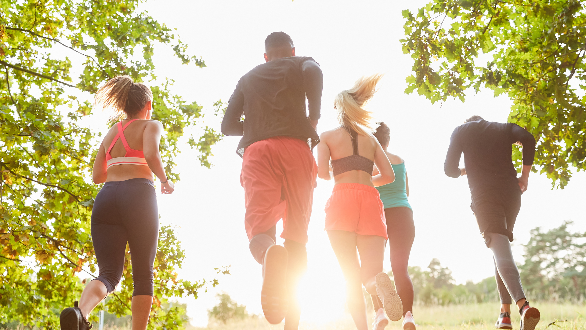 Group of people running outdoors