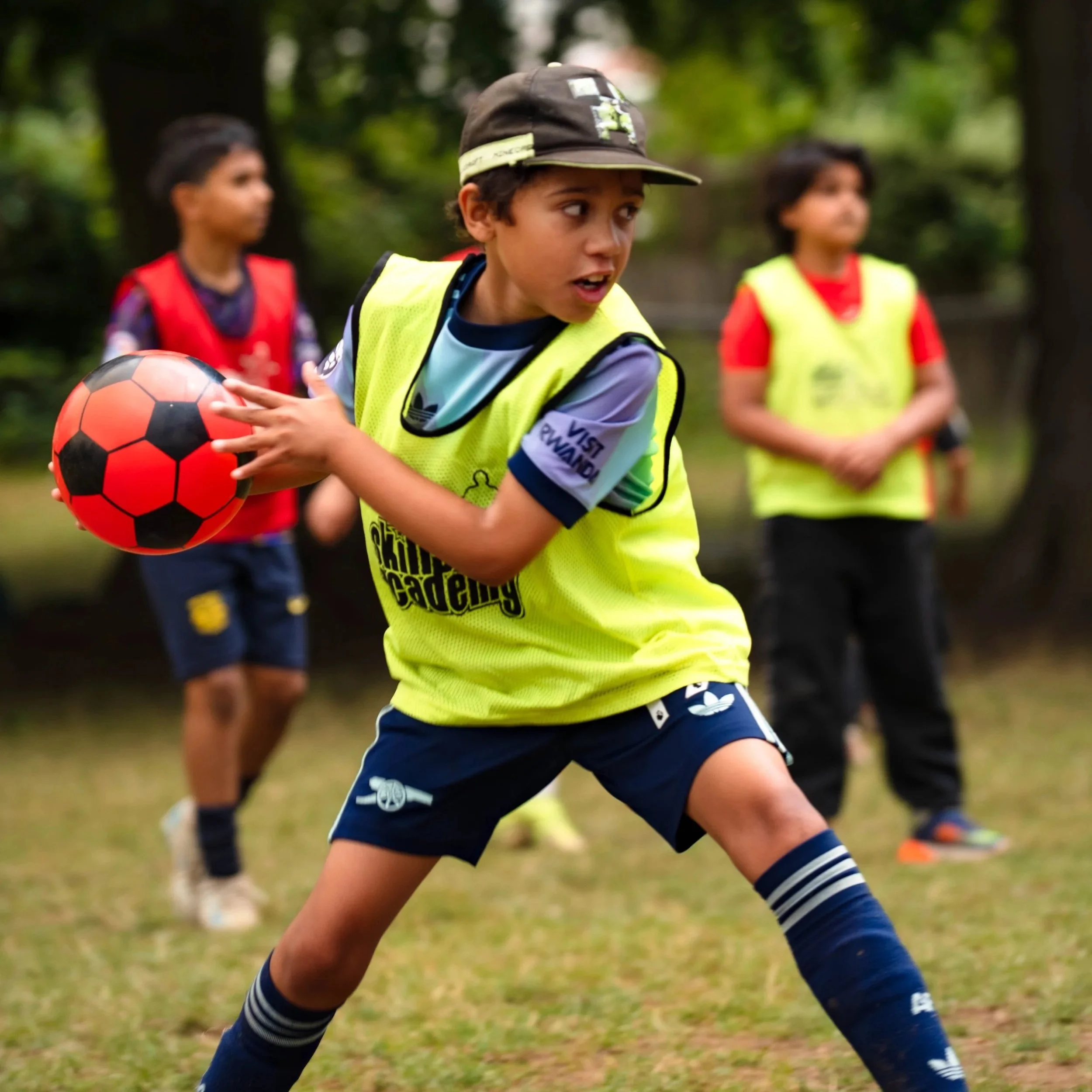 A young boy playing football 