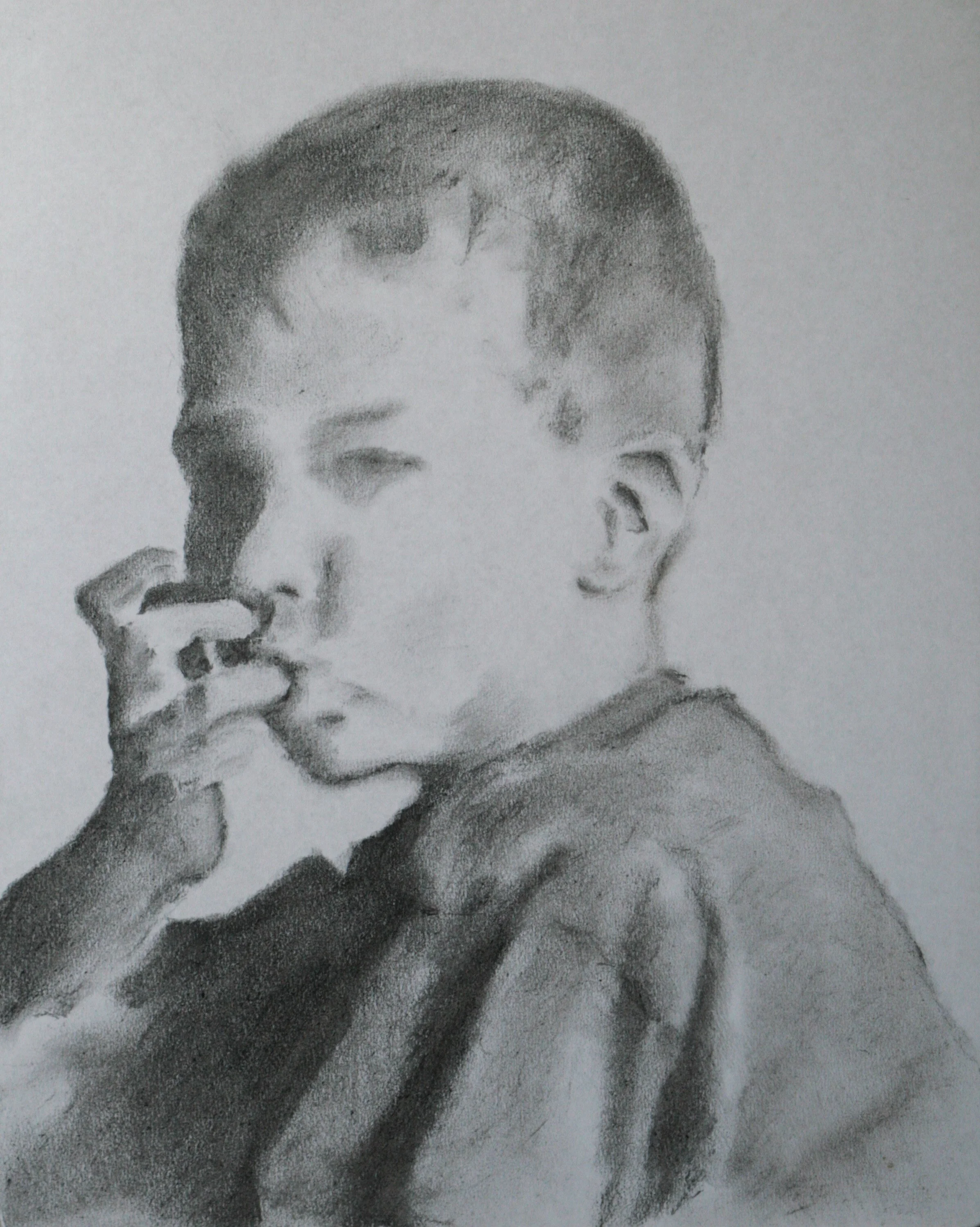 Leander als Kind 2025, Kohle, Karton, 50 x 42 cm