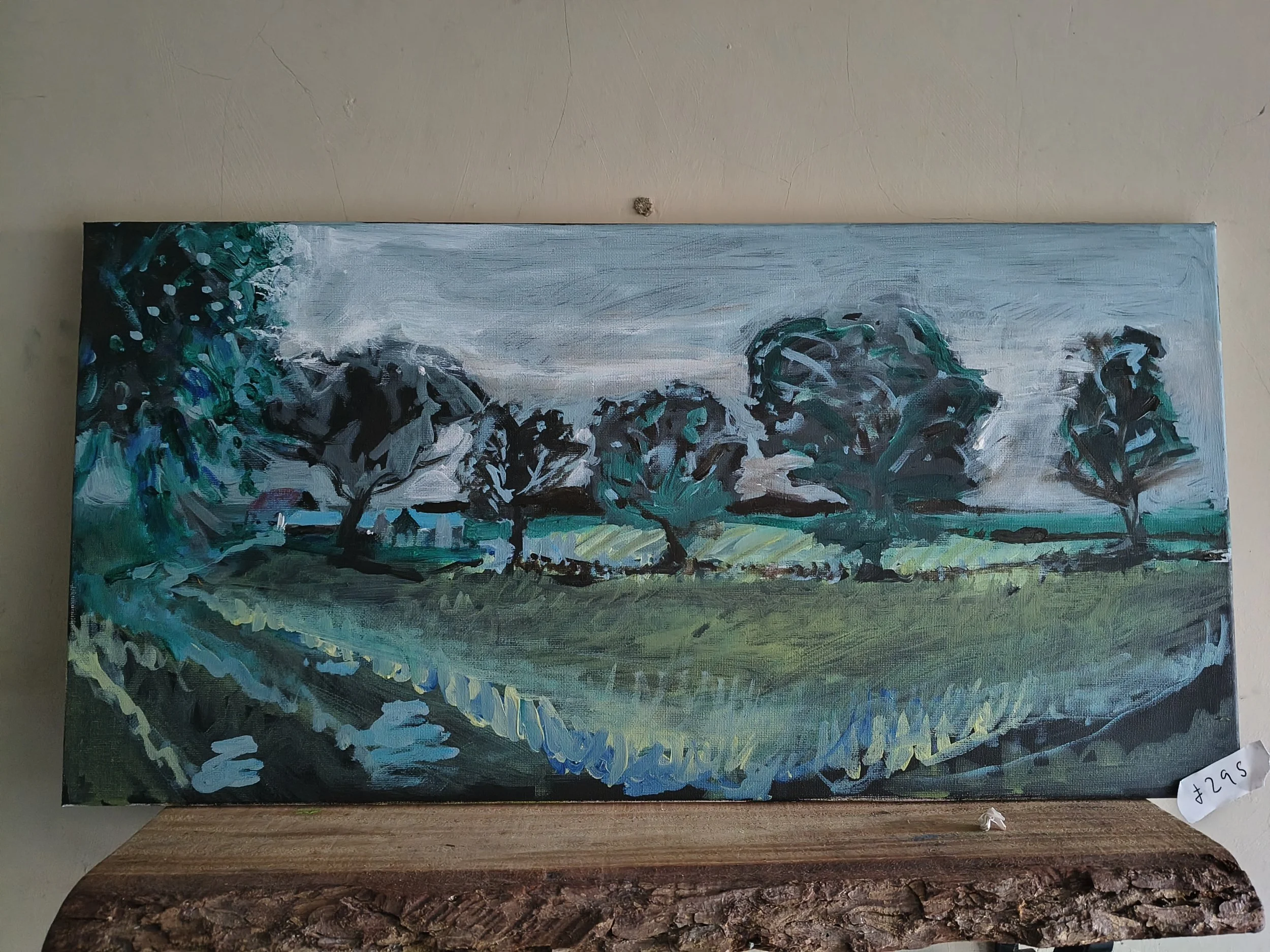 A landscape painting of a rural scene with five trees, green fields, and a cloudy sky, painted with loose brushstrokes.