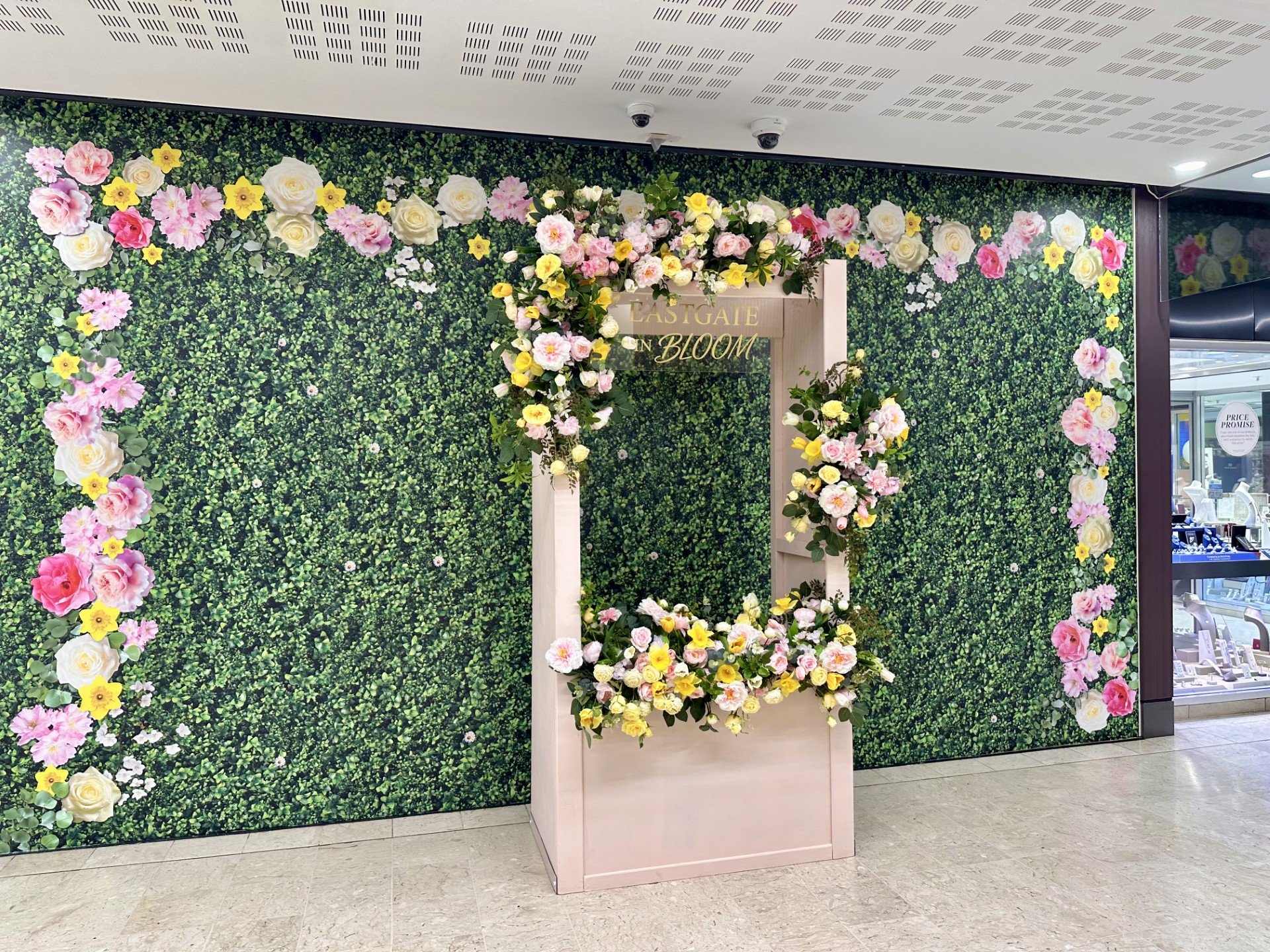An image of a storefront with eye-catching window graphics.