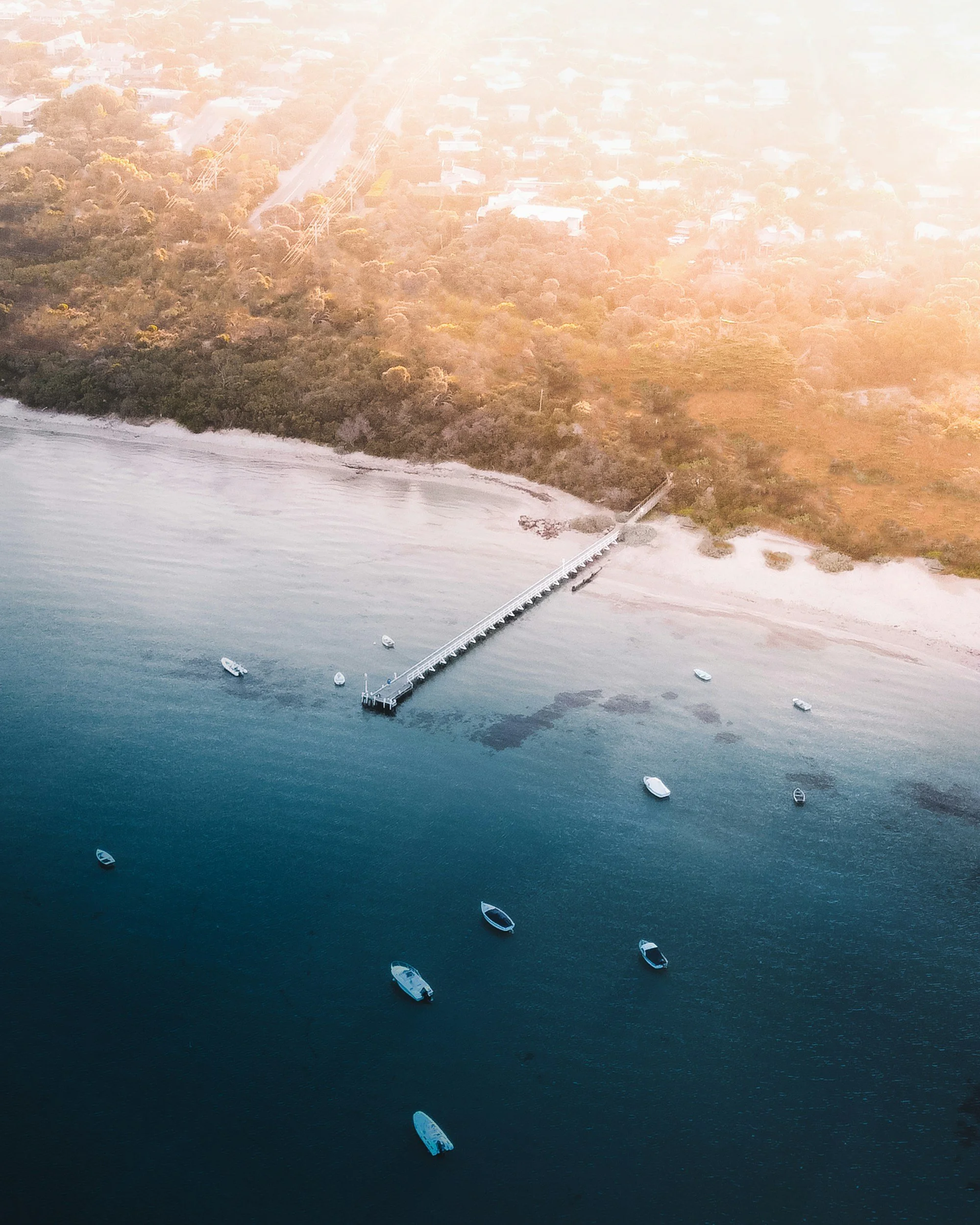 Aerial view of pier and beach at Blairgowrie in the Mornington Peninsula region