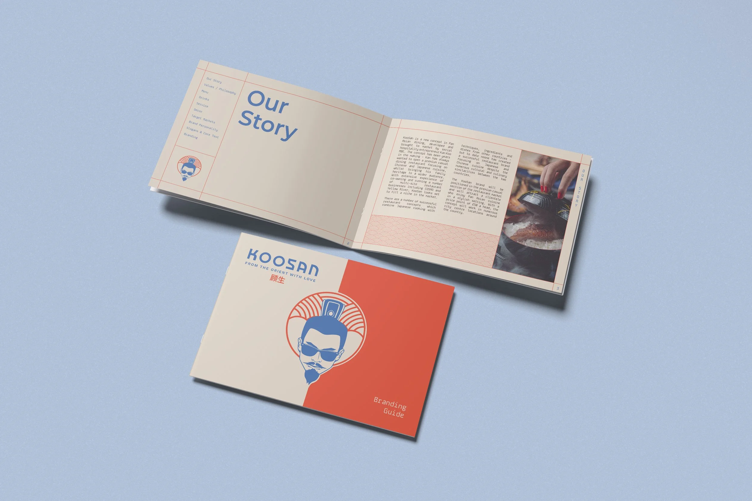 Open branding guide booklet with a cover featuring a stylized illustration of a man with sunglasses, a goatee, and a bun, along with the text 'KOOSAN FROM THE ORIENT WITH LOVE'. The booklet is lying on a light blue surface, with the front cover visible beneath an open spread showing handwritten-style text and images of a person cooking.