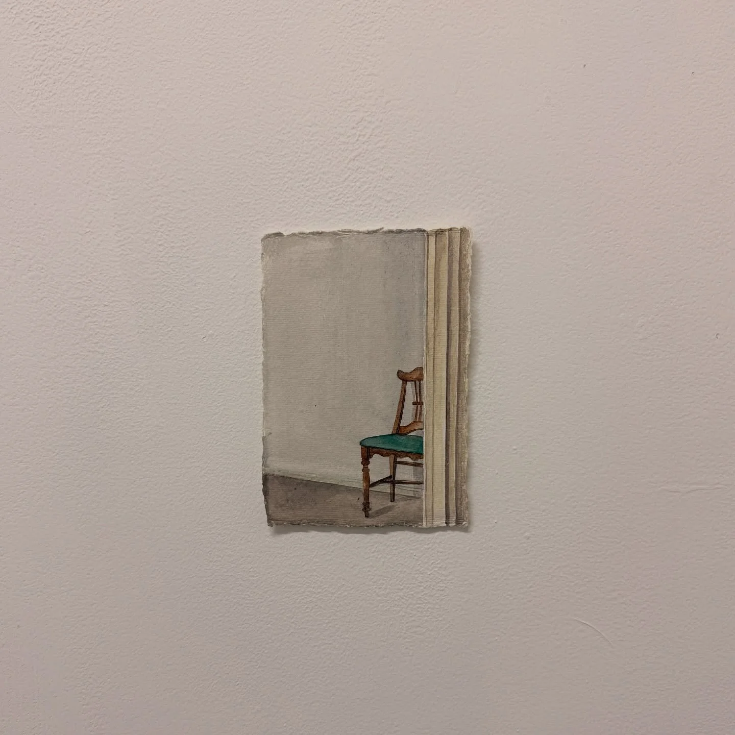 A chair rests at the edge of silence, turning emptiness into presence.