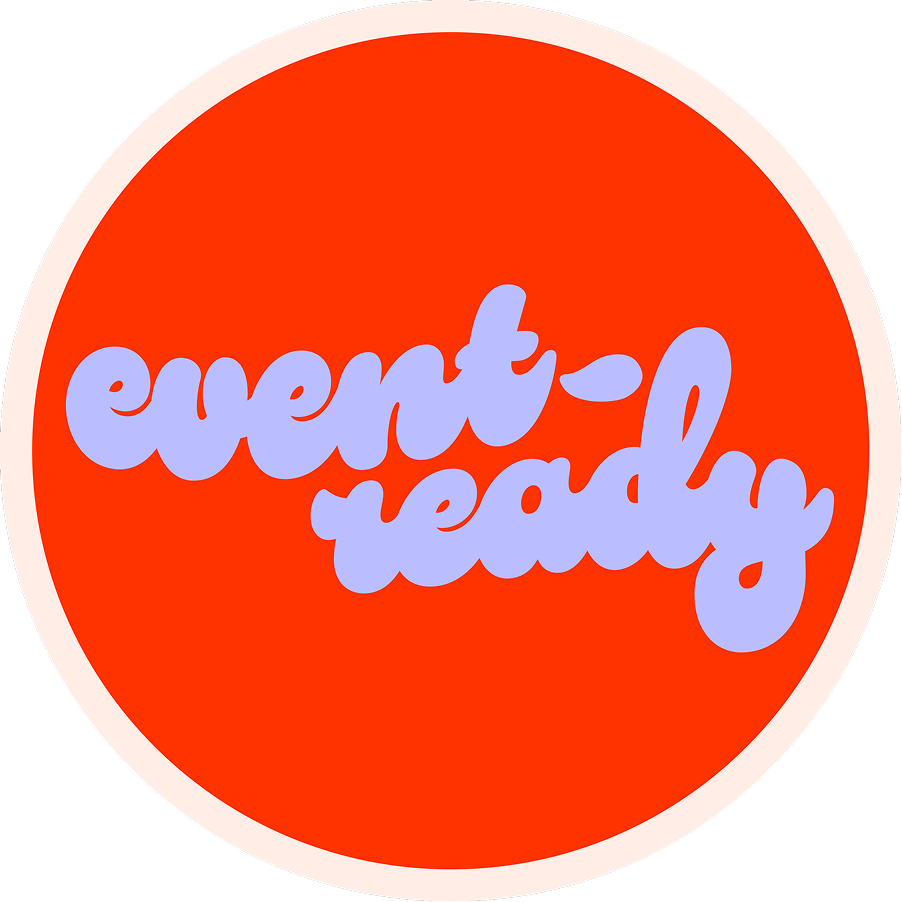 A circular sticker with a red background, white border, and the words 'event-ready' written in light purple cursive font.