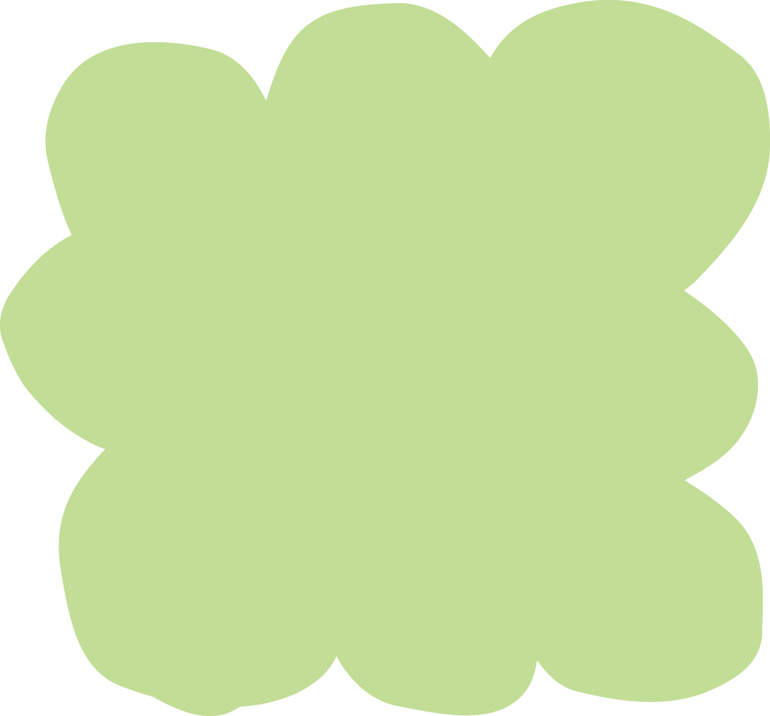 A green four-leaf clover with a slightly textured surface.